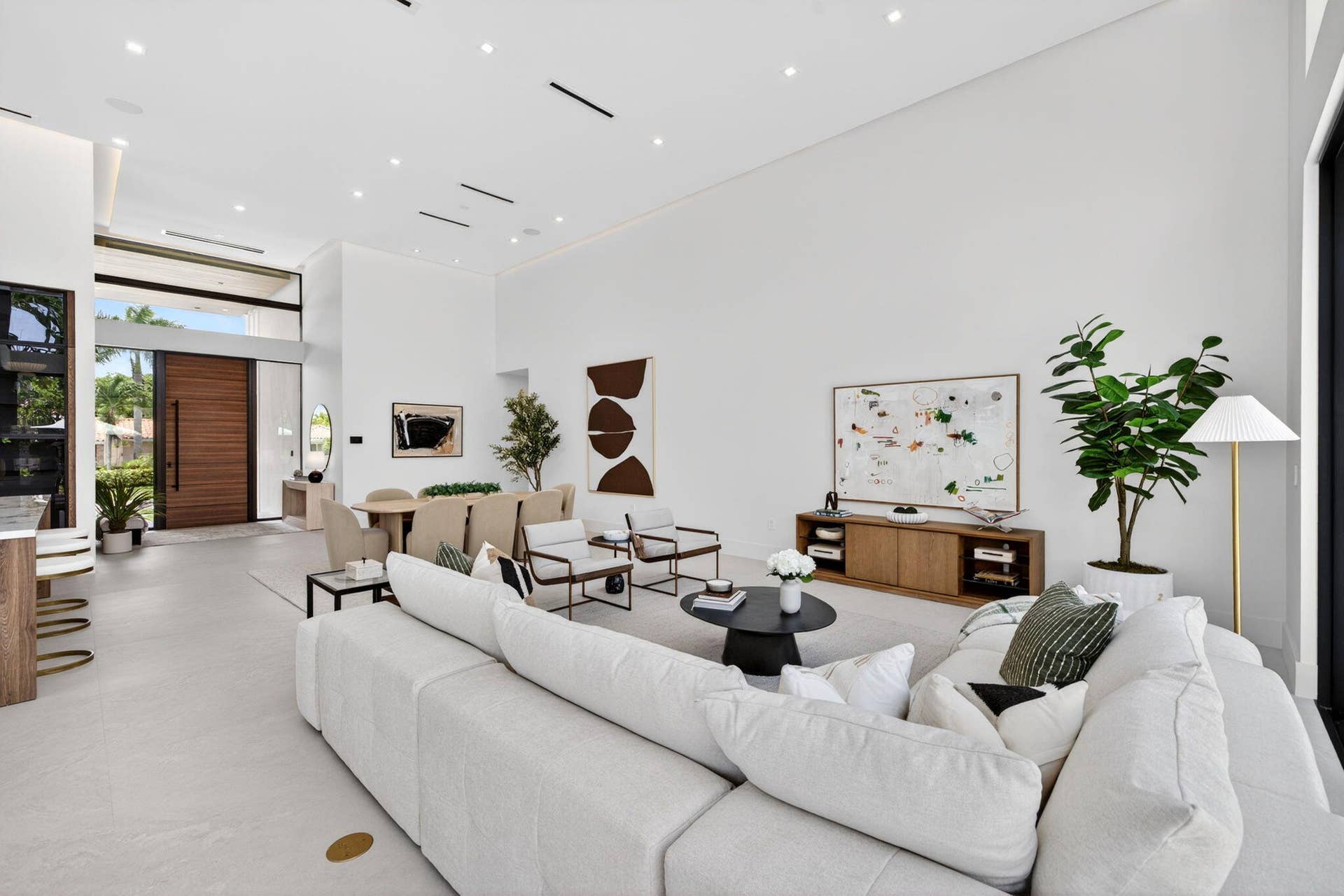 2717 NE 33rd Street, Fort Lauderdale, FL 33306 The main living areas are designed for comfort and entertaining, with elevated finishes and generous natural light throughout.