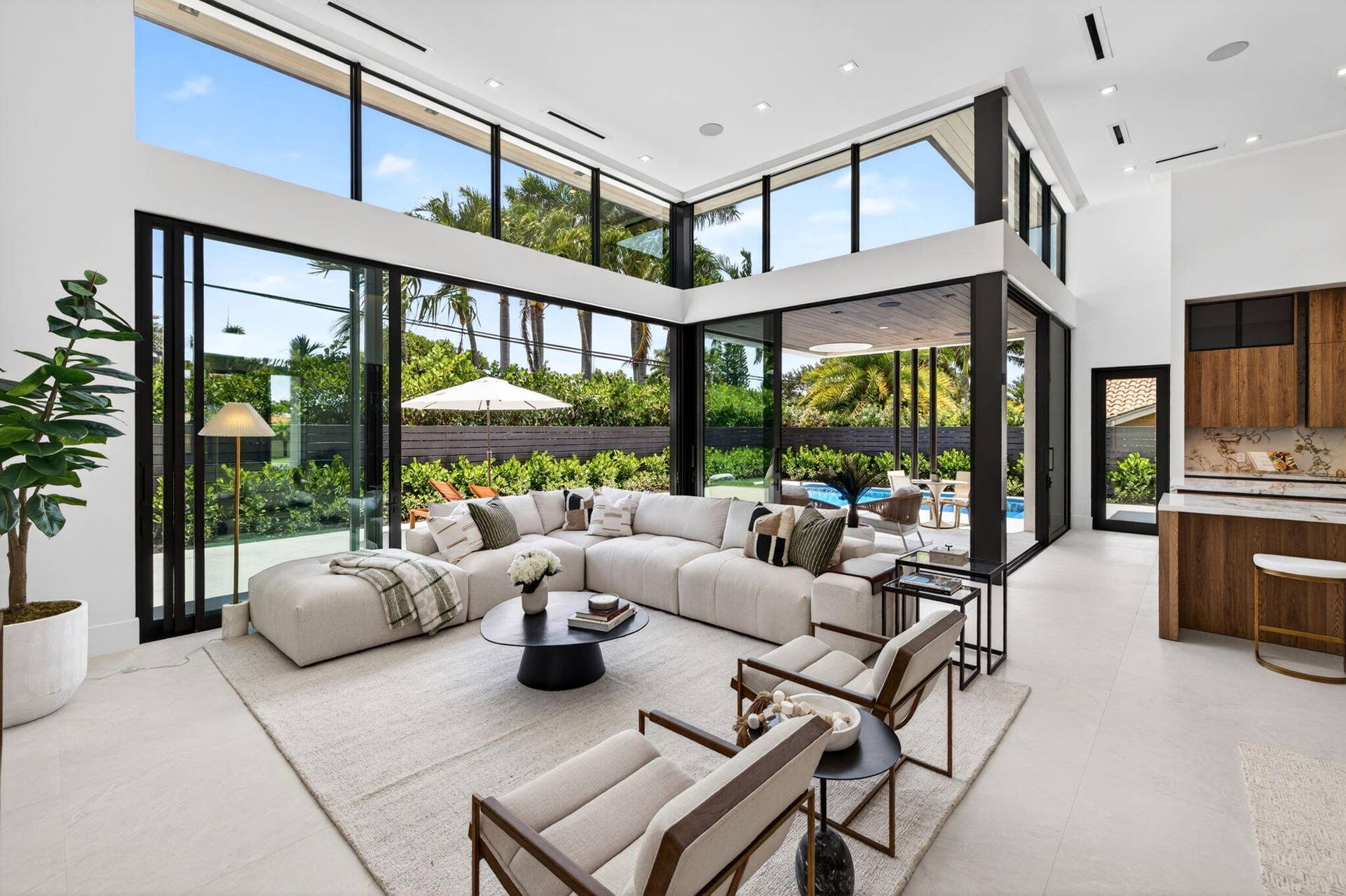 2717 NE 33rd Street, Fort Lauderdale, FL 33306 Light-filled interiors emphasize dramatic volume, clean modern finishes, and a seamless connection between living and entertaining spaces.