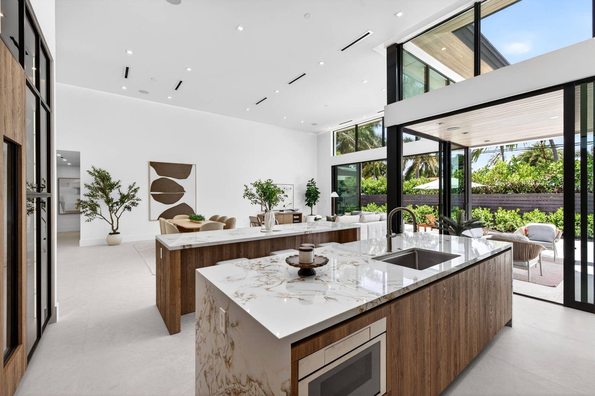 2717 NE 33rd Street, Fort Lauderdale, FL 33306 The main living areas are designed for comfort and entertaining, with elevated finishes and generous natural light throughout.