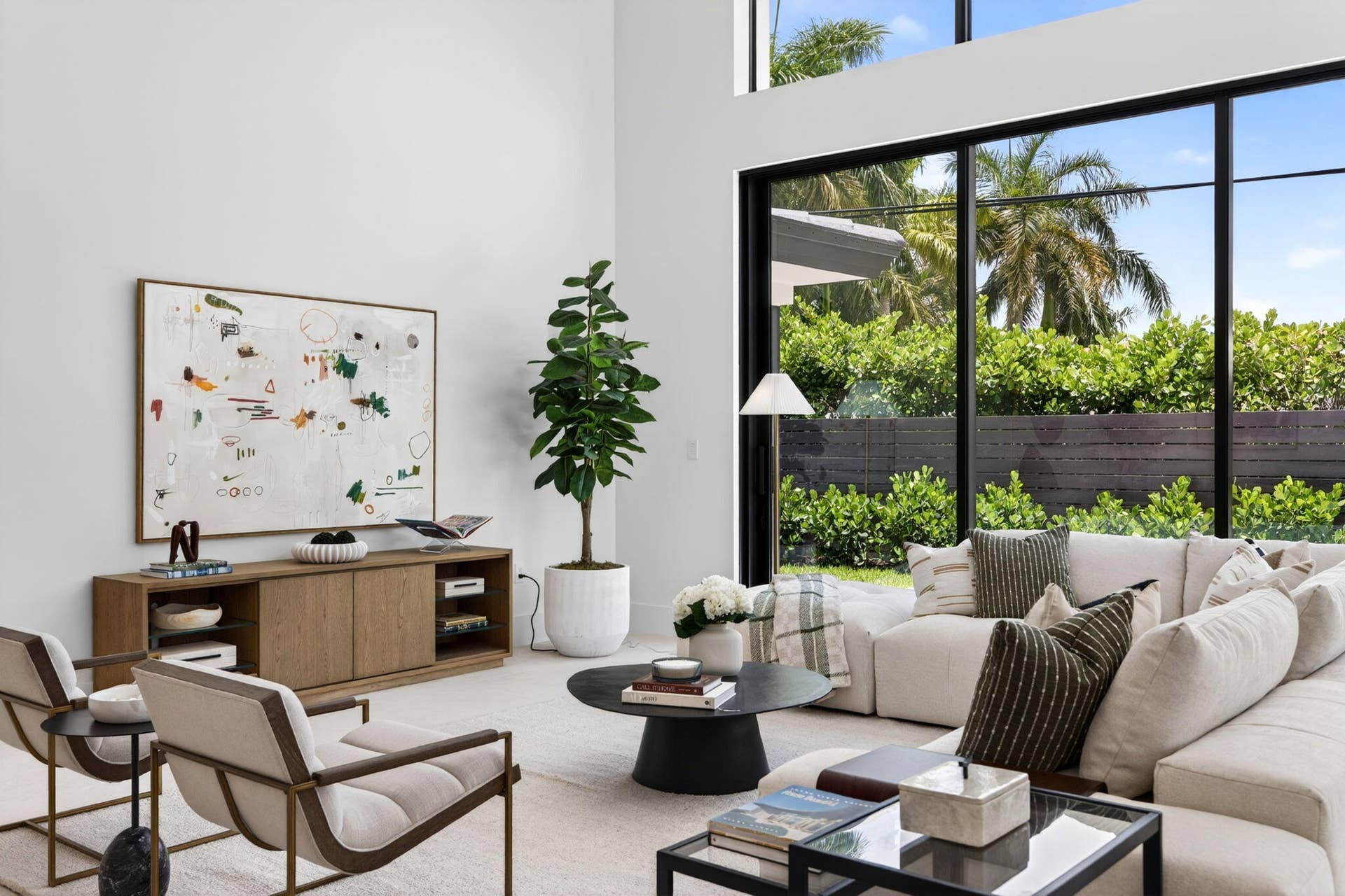 2717 NE 33rd Street, Fort Lauderdale, FL 33306 Light-filled interiors emphasize dramatic volume, clean modern finishes, and a seamless connection between living and entertaining spaces.