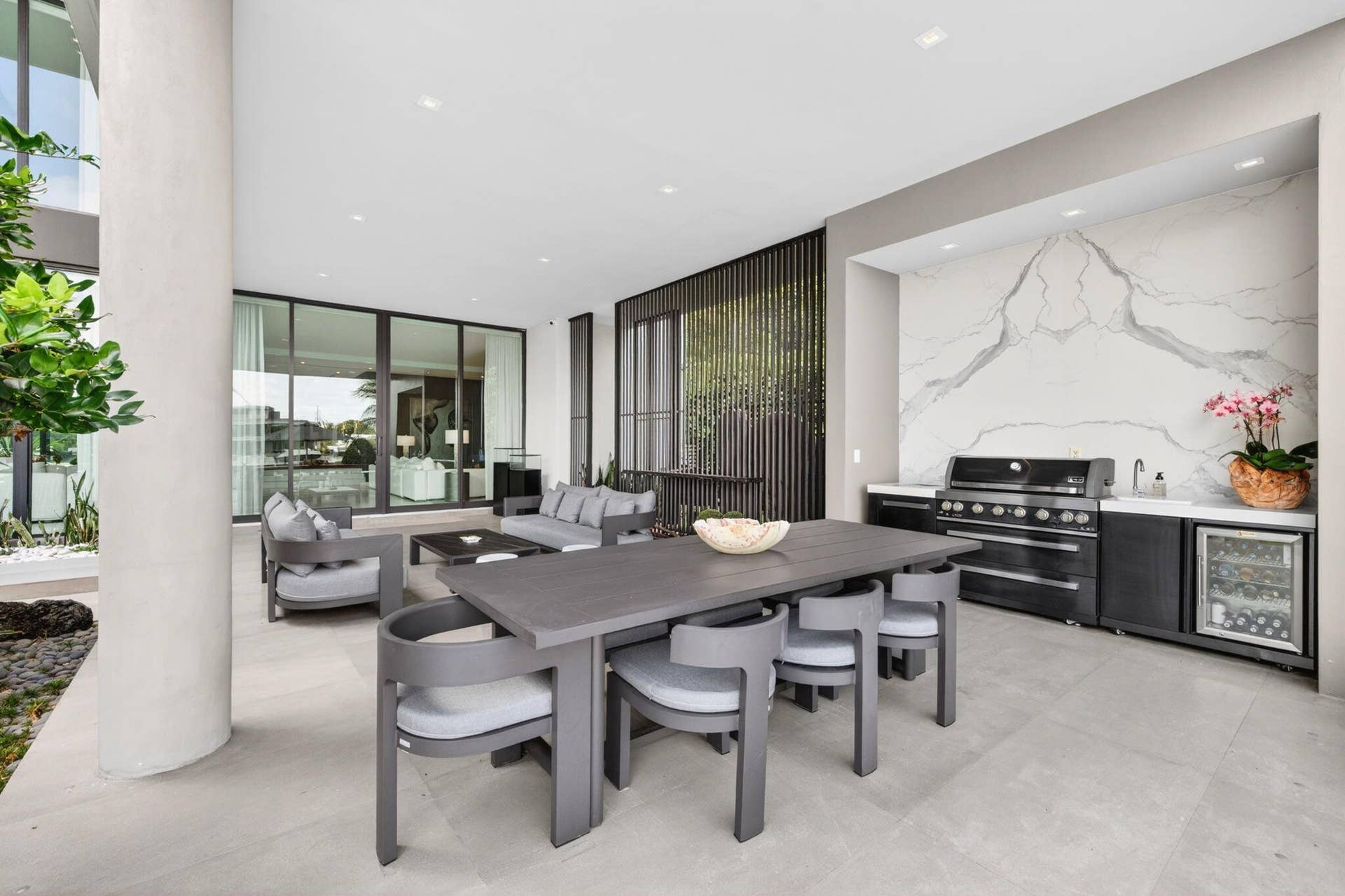 An elegant culinary environment designed for both daily living and grand entertaining, with custom cabinetry, refined surfaces, and effortless flow to the main living spaces.