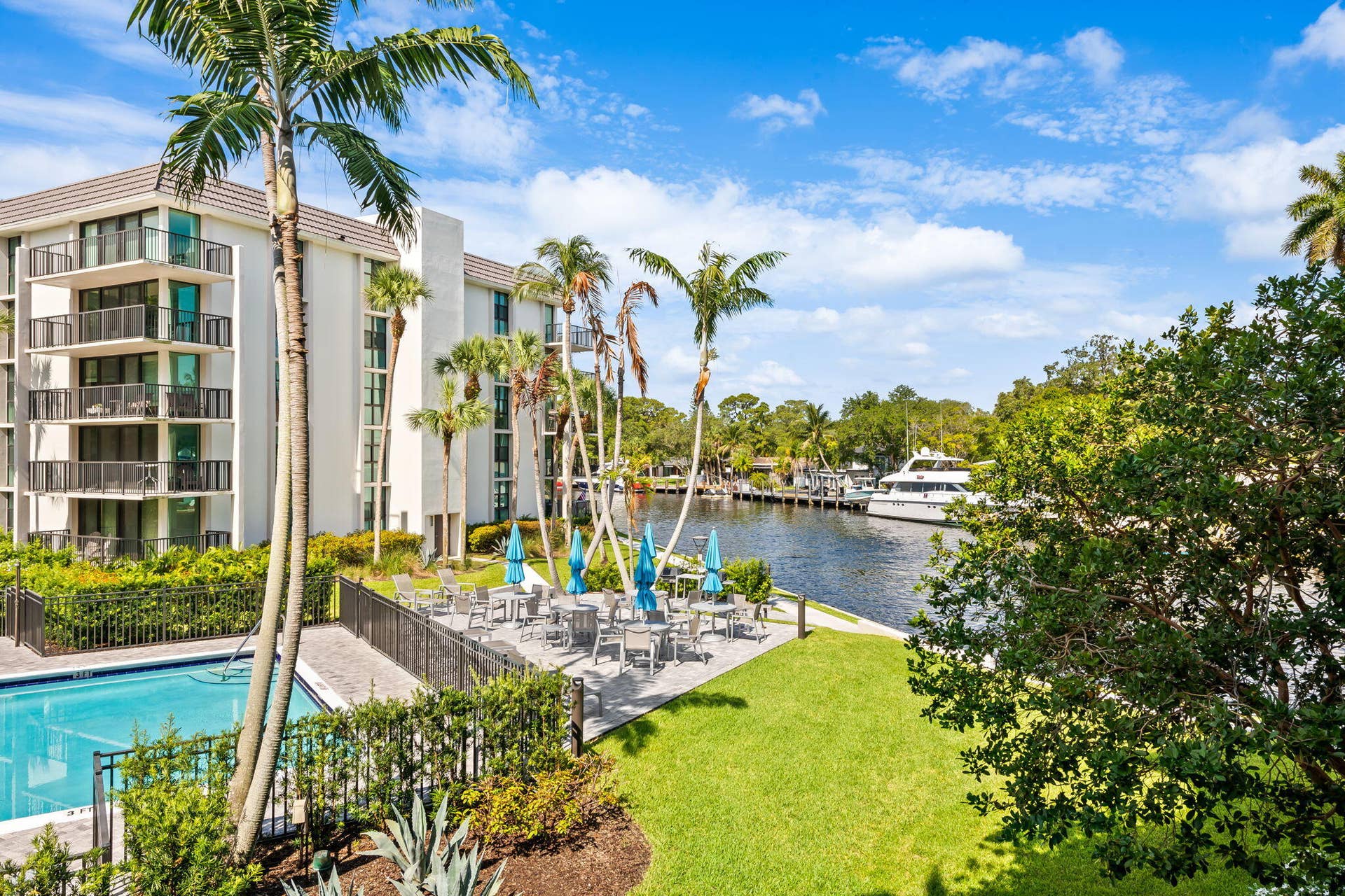 1301 River Reach Drive, #202, Fort Lauderdale, FL 33315 Pool, Barbque Area, and River Views