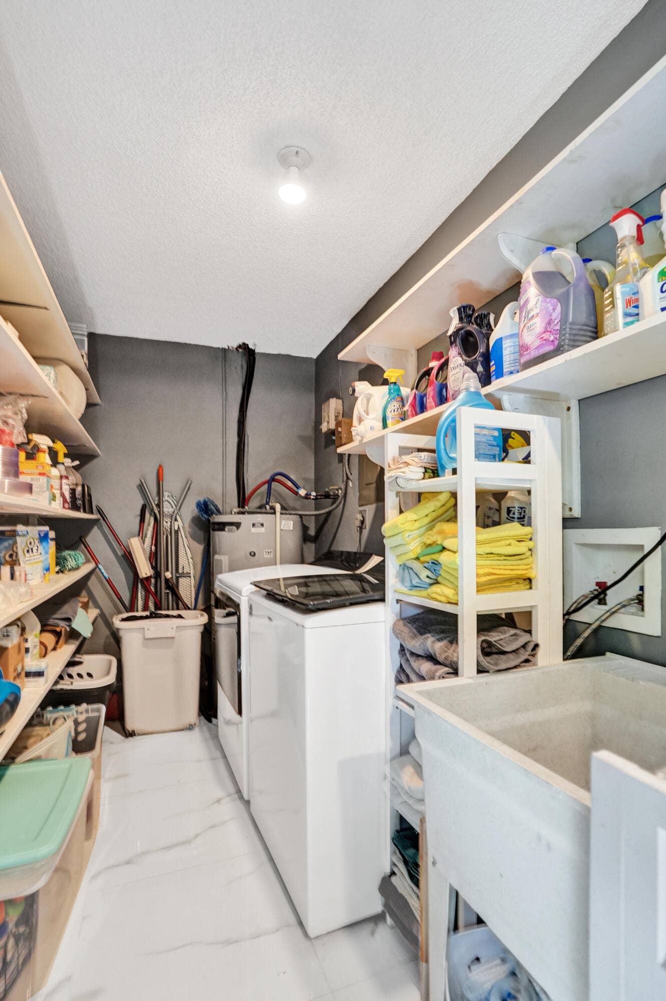 307 SE 14th Place, Deerfield Beach, FL 33441 Laundry/Storage area interior off of kitchen