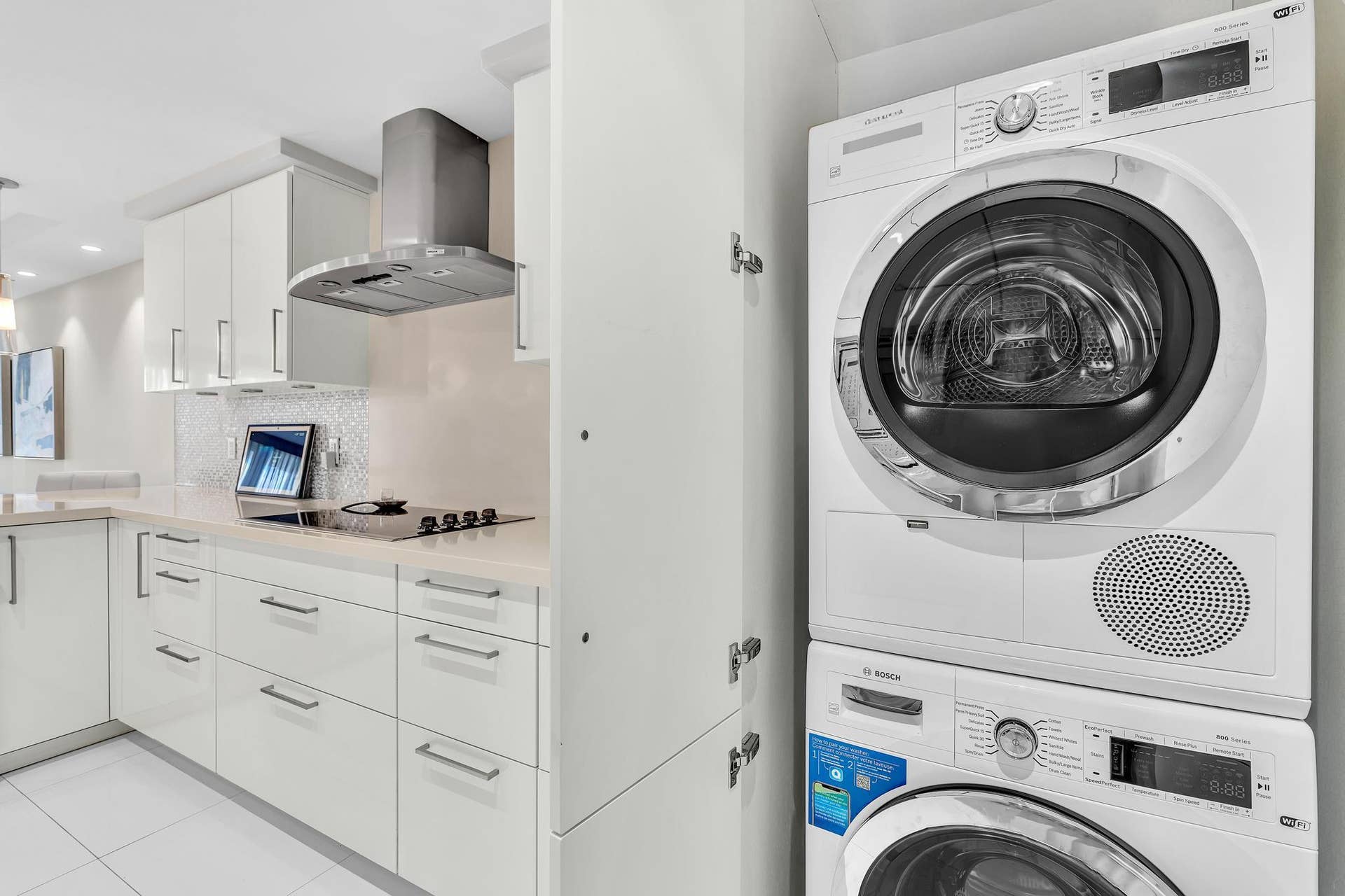 4020 Galt Ocean Drive, #703, Fort Lauderdale, FL 33308 Bosch Washer/Dry in Kitchen Behing Custom Cabinetry