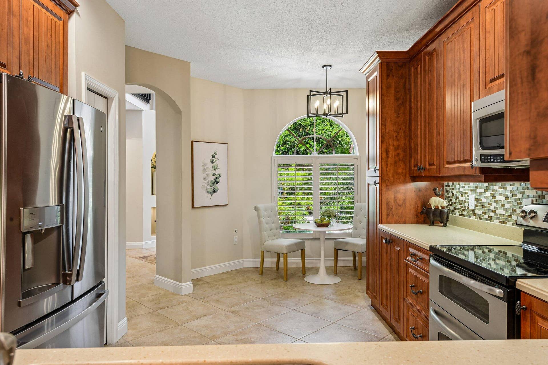 692 W Palm Aire Drive, Pompano Beach, FL 33069 Chefs Kitchen With A Cozy Breakfast Nook