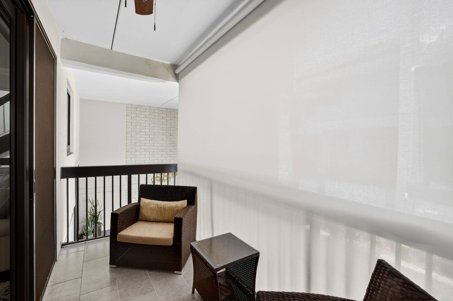Balcony off Main Living area, with privacy screens displayed