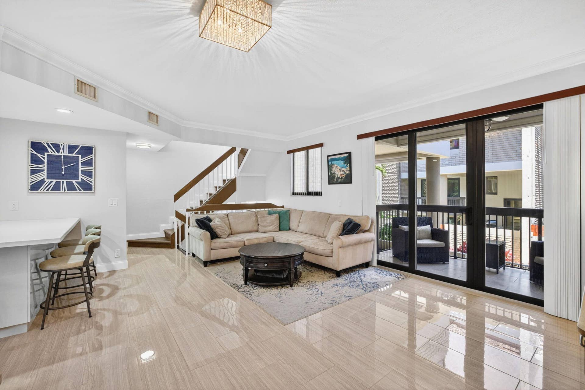 Off the Main Living Area there is a Balcony overlooking the multiple outdoor spaces of the townhome