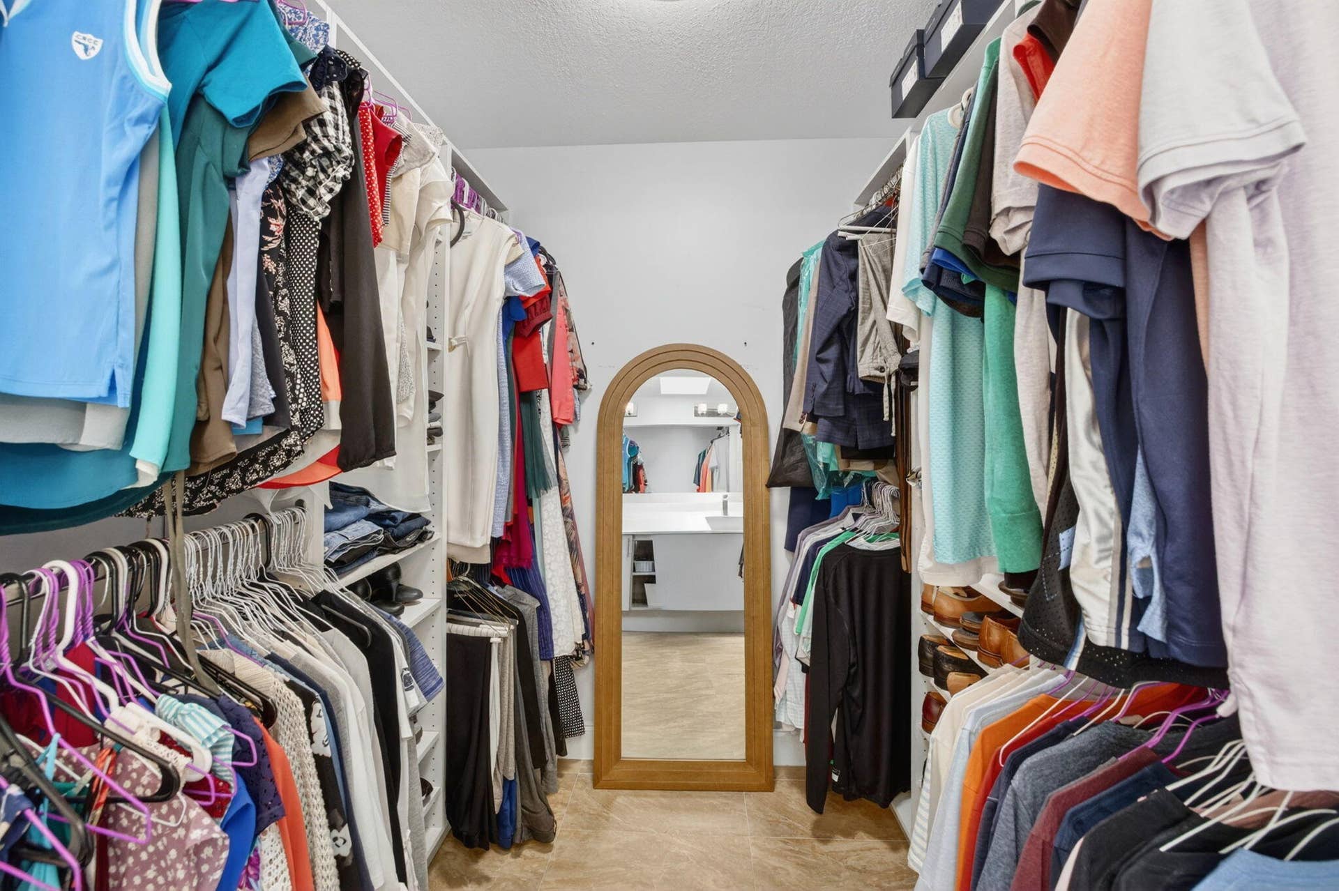 Primary Bedroom walk-in closet