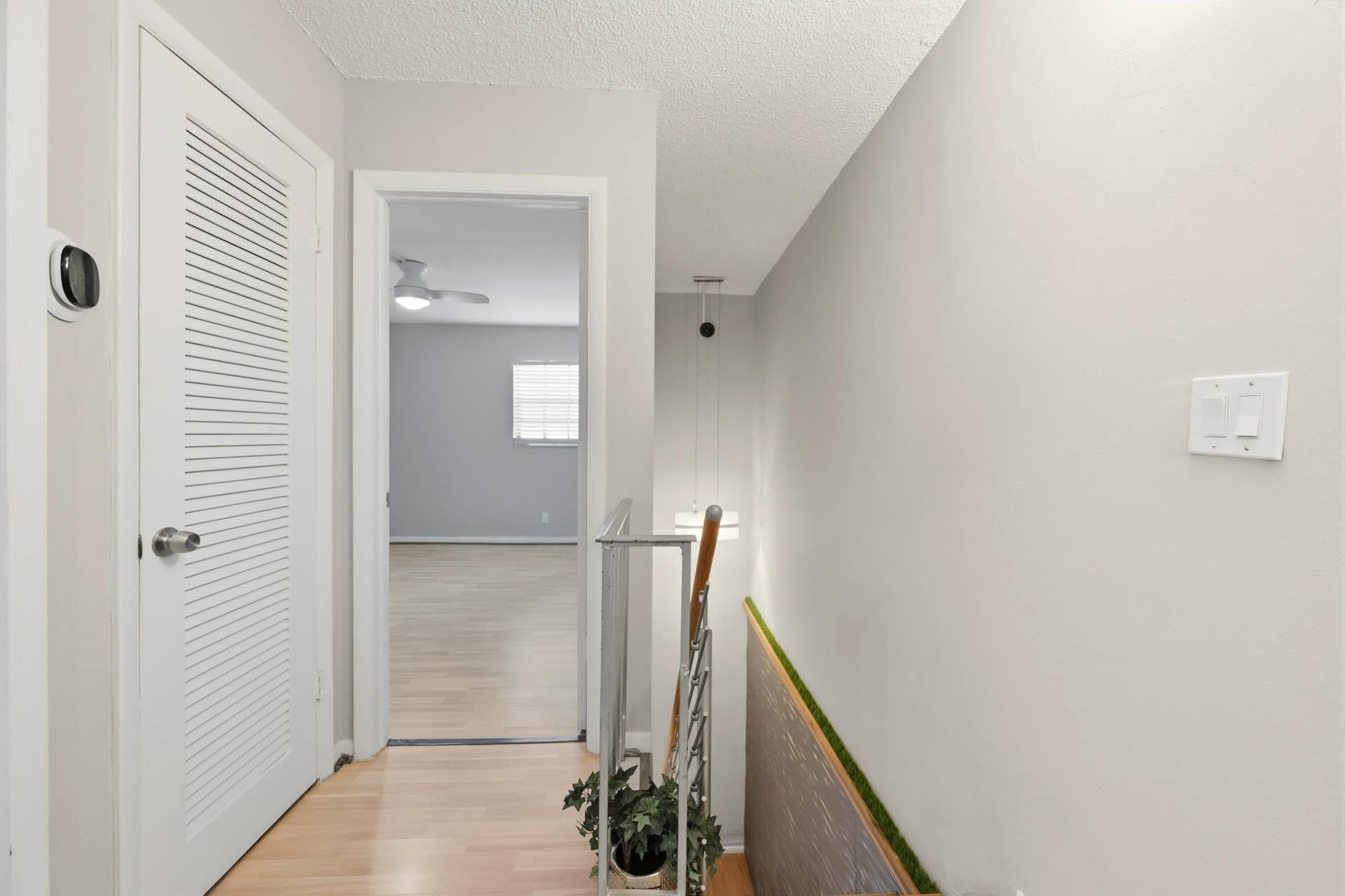 905 NE 28th Street, #206, Wilton Manors, FL 33334 Thoughtfully designed staircase enhancing the home's functional multi level layout.