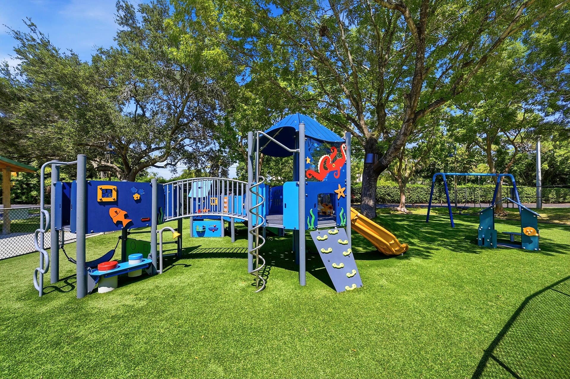905 NE 28th Street, #206, Wilton Manors, FL 33334 Children's playground offering a fun place for families to gather and enjoy the outdoors.