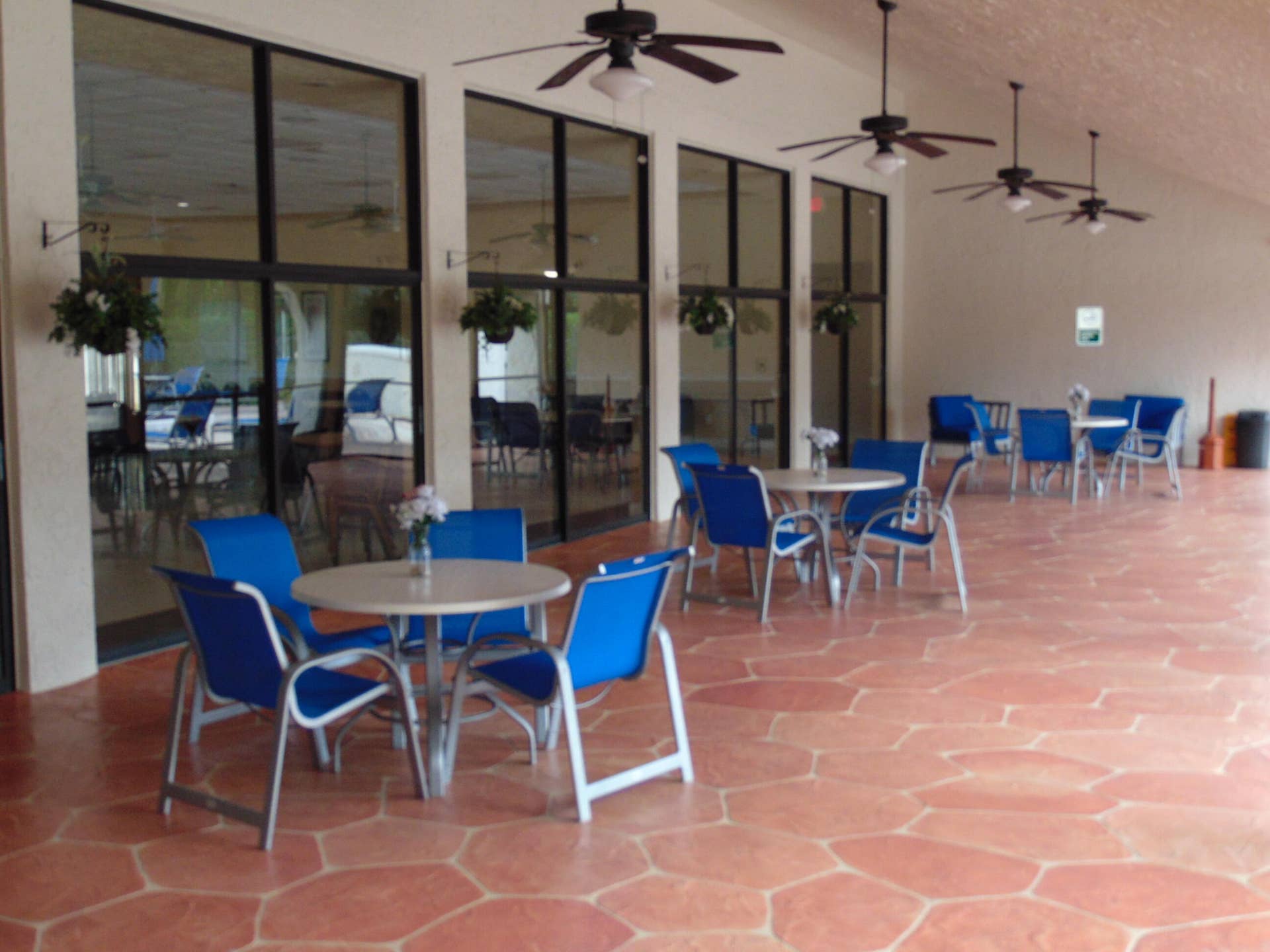 9220 SW 14th Street, #3103, Boca Raton, FL 33428 ROOFED SCREENED PATIO WITH CEILING FANS AT CLUBHOUSE