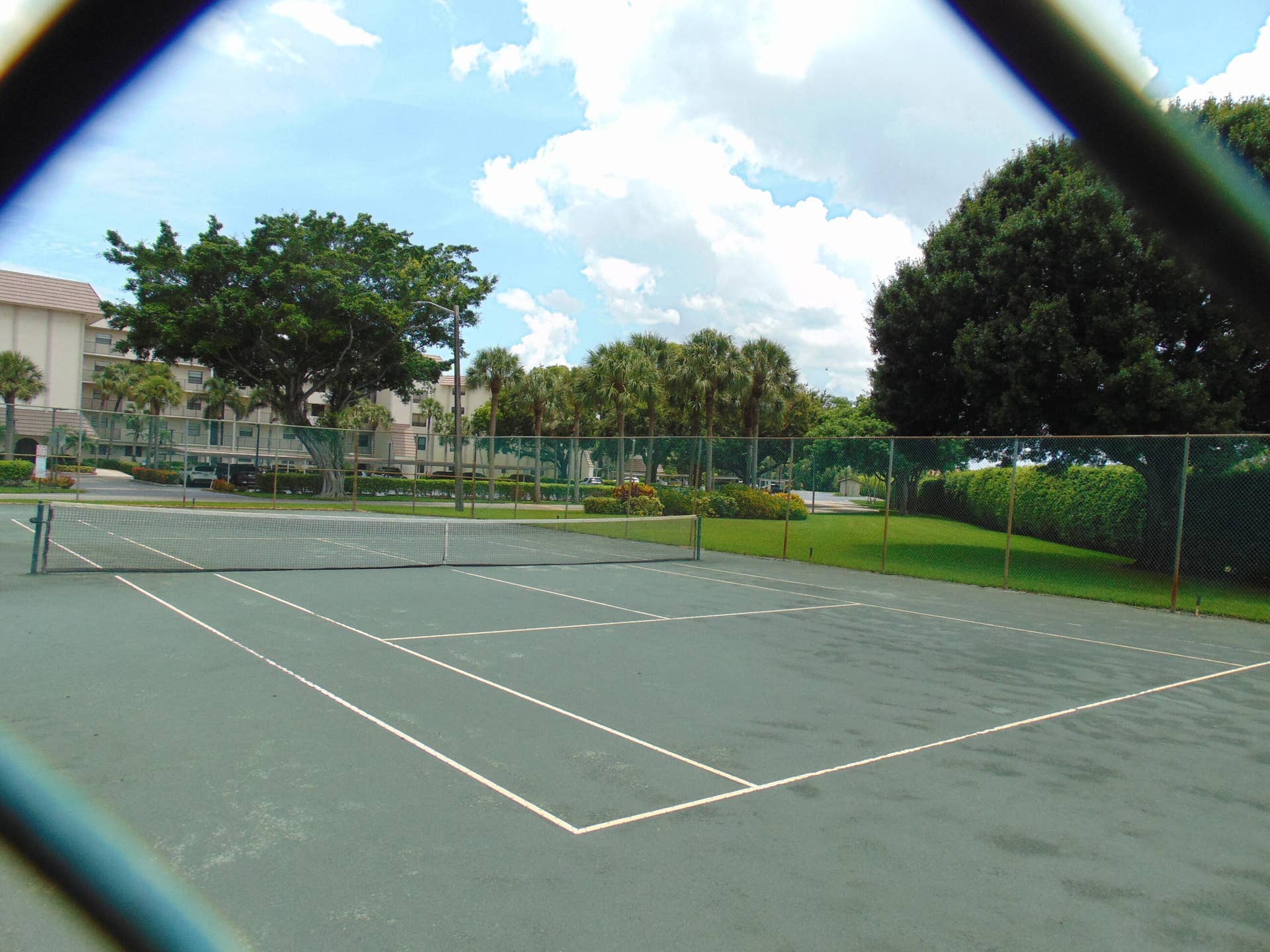 9220 SW 14th Street, #3103, Boca Raton, FL 33428 TENNIS COURT WITH SHADED PATIO AREA AND GAS GRILL