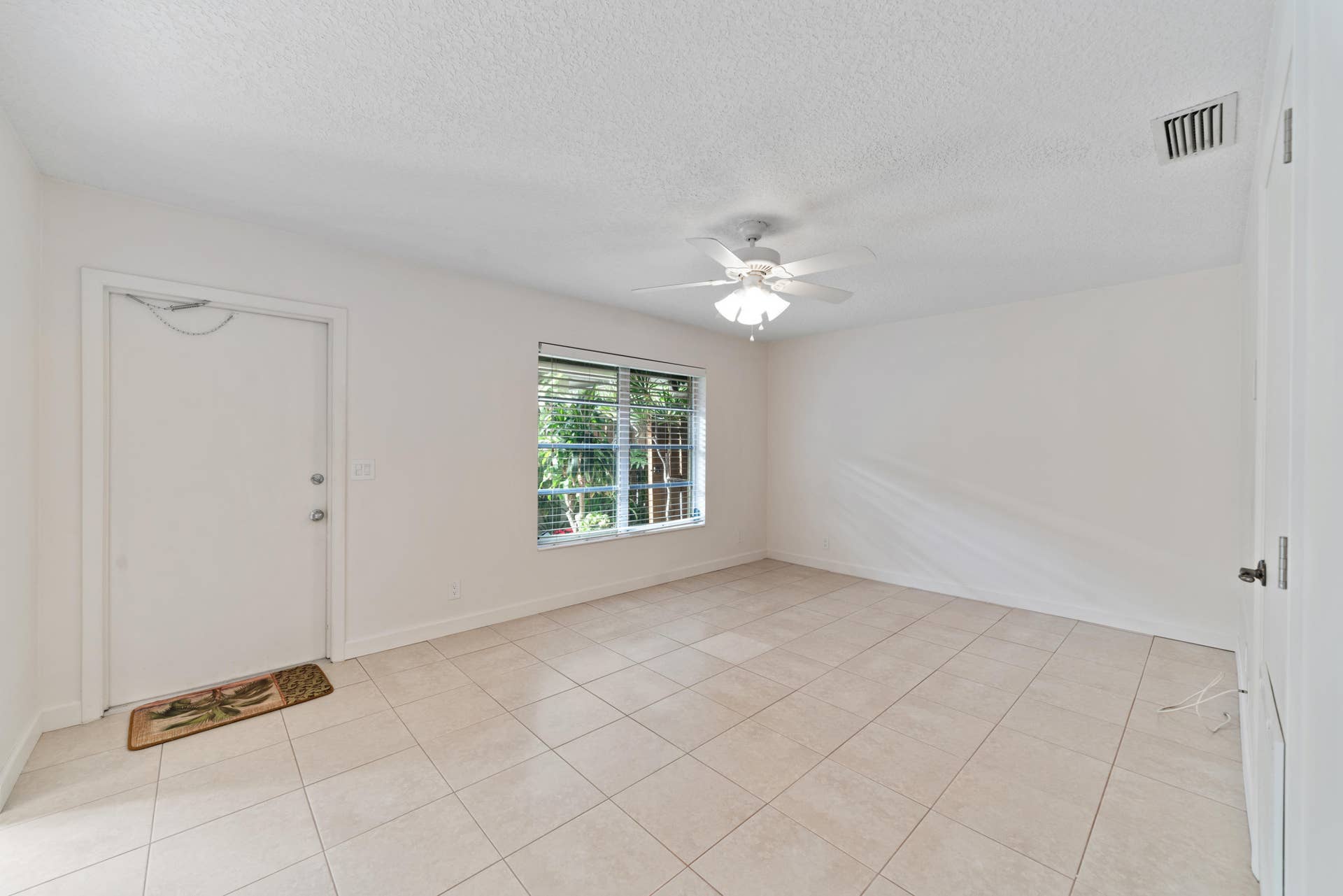LIVING ROOM OF 3 OF THE 2/1 UNITS.