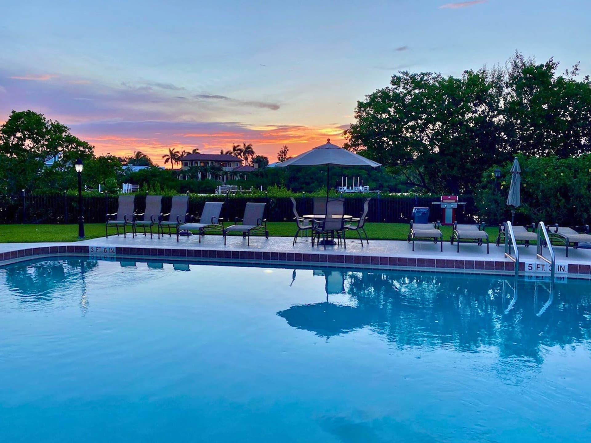 3605 S Ocean Boulevard, #229, South Palm Beach, FL 33480 Pool front sunset
