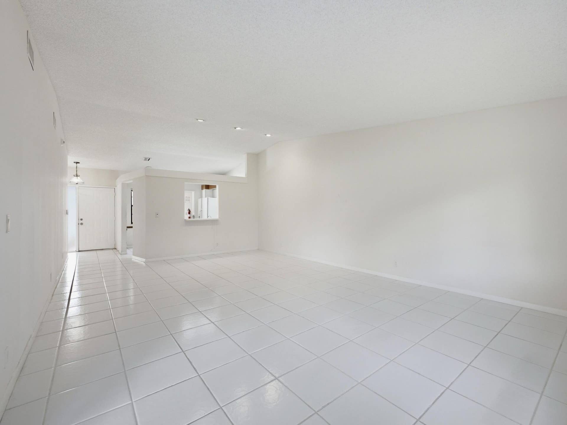 6200 Kings Gate Circle, Delray Beach, FL 33484 Living to Dining Kitchen
