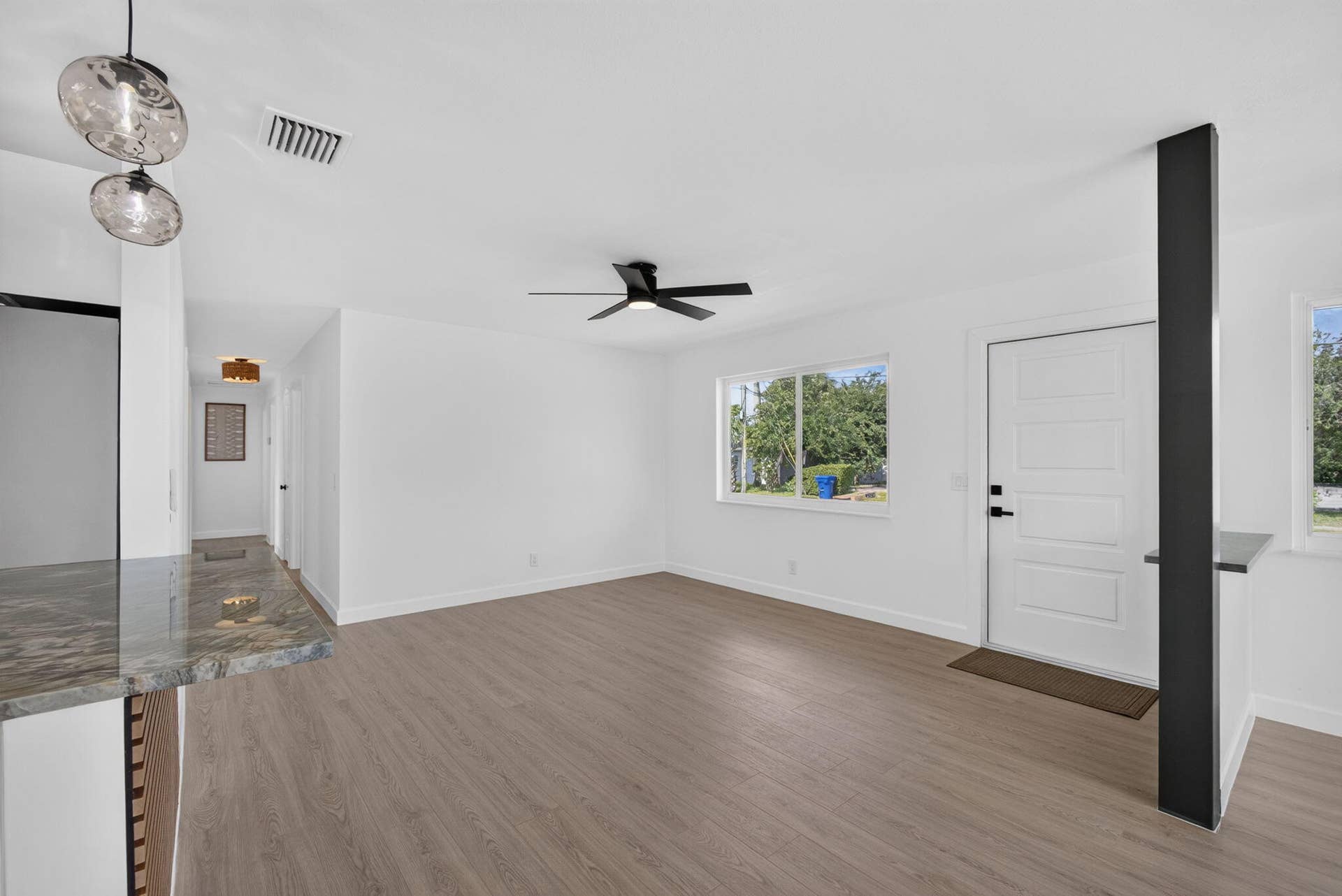 665 W 7th Street, Riviera Beach, FL 33404 Living room & breakfast bar
