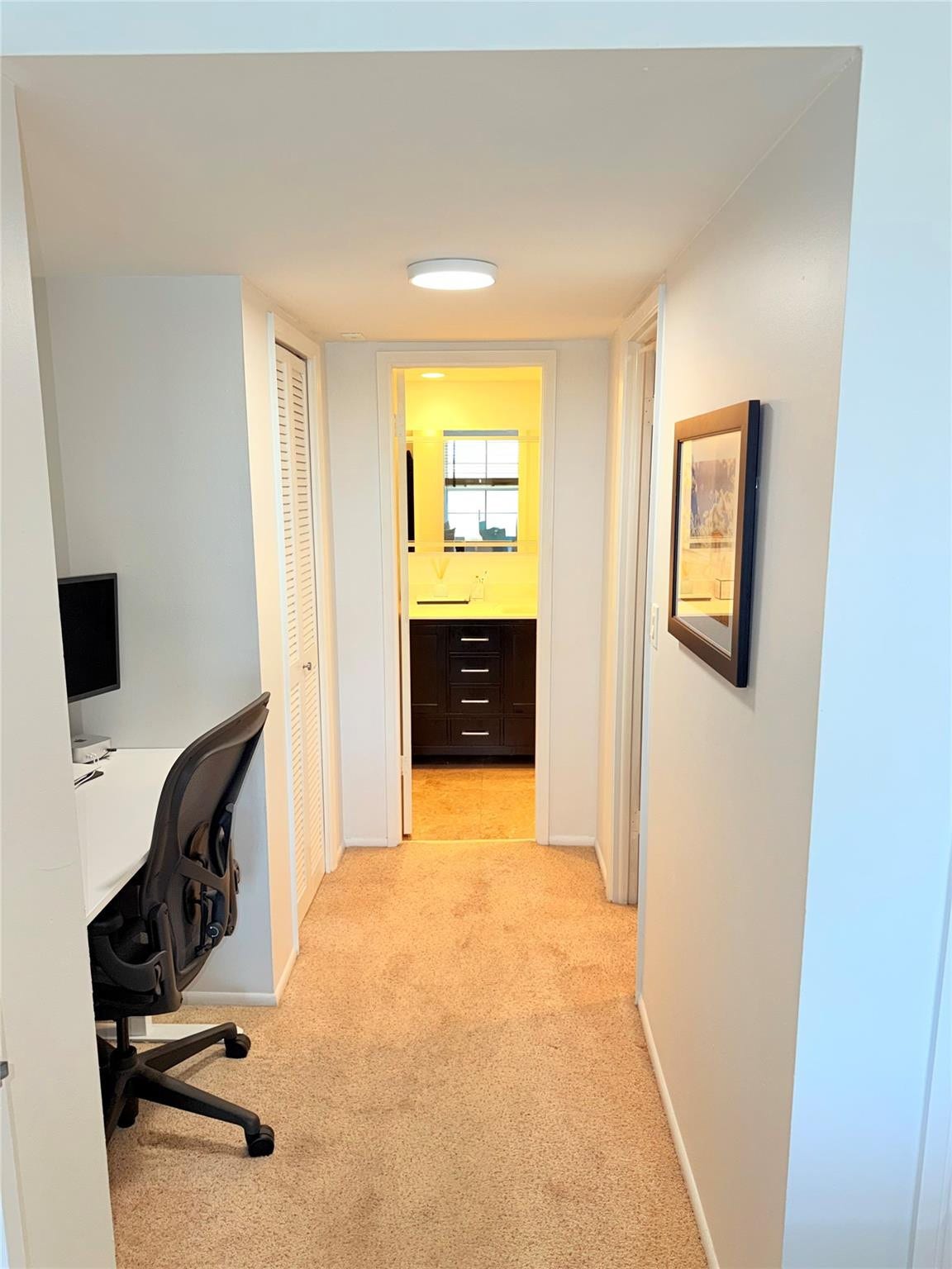 2801 N Palm Aire Drive, #604, Pompano Beach, FL 33069 Hallway to Bathroom with office nook