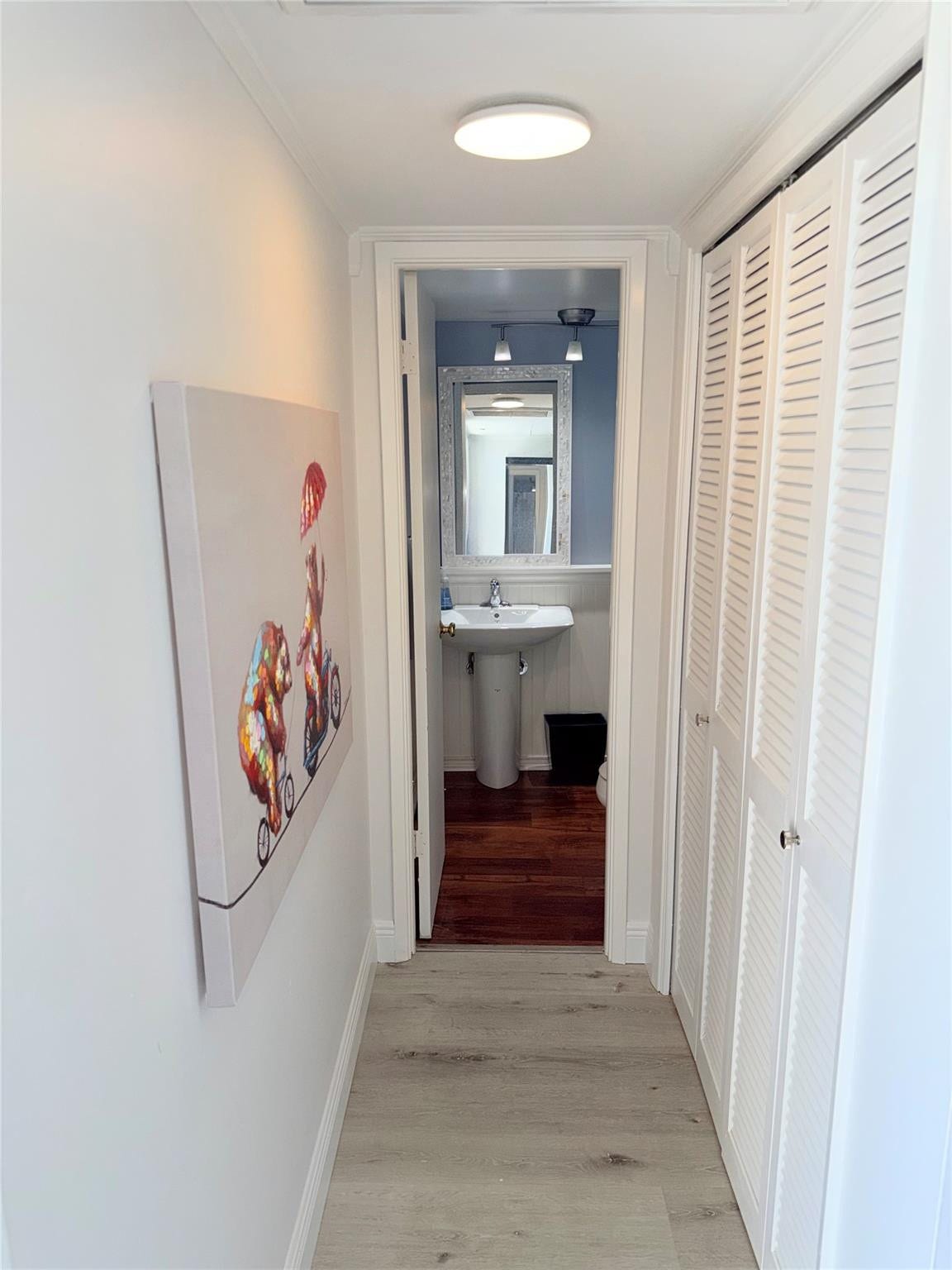 2801 N Palm Aire Drive, #604, Pompano Beach, FL 33069 Hallway to half bath