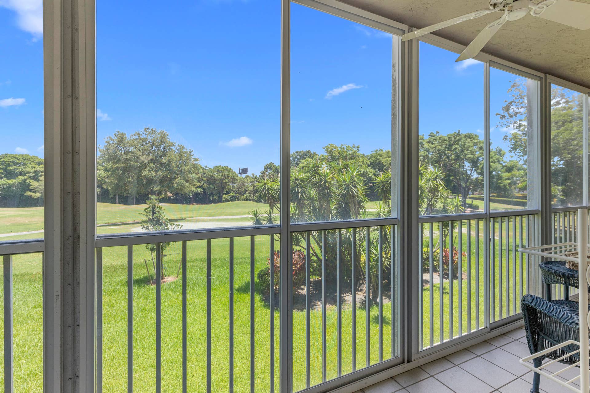 Peaceful living! covered screened patio overlooking the beautiful private 18 hole golf course