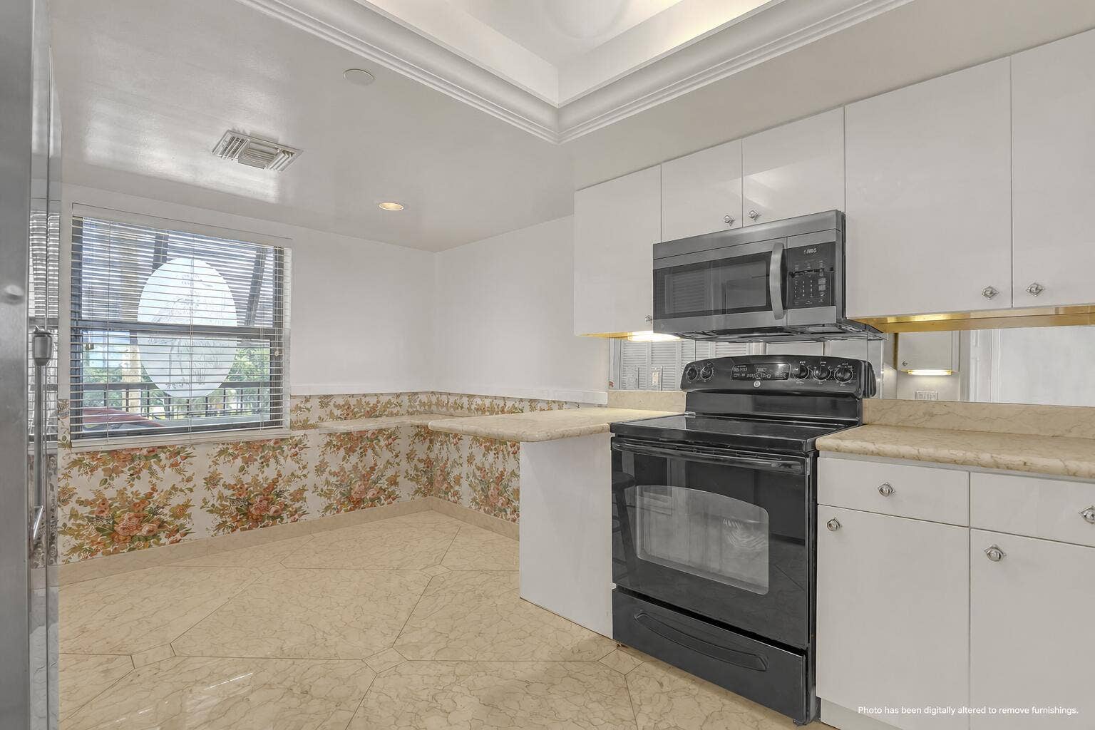 356 Golfview Road, #403, North Palm Beach, FL 33408 Morning coffee with a garden view
