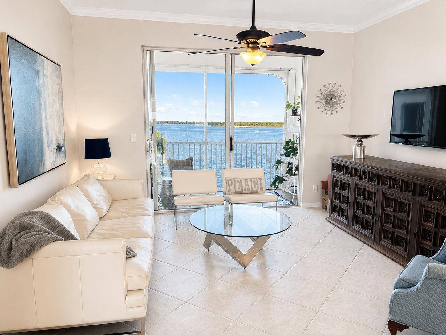 100 Paradise Harbour Boulevard, #506, North Palm Beach, FL 33408 Living room as beautiful views of the intracoastal waterway.