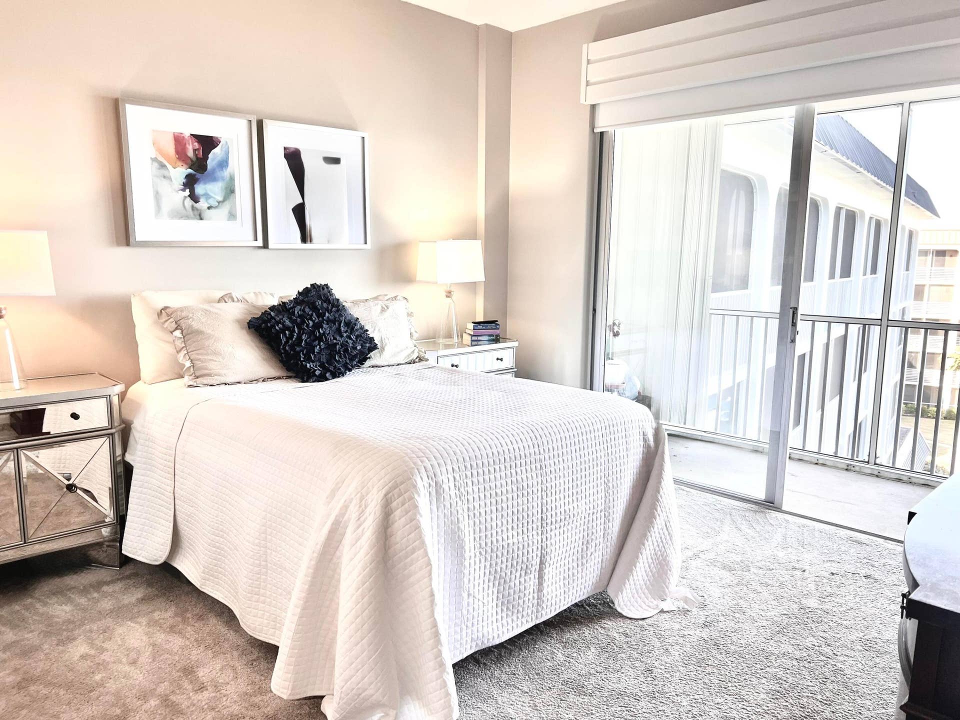 100 Paradise Harbour Boulevard, #506, North Palm Beach, FL 33408 Promary bedroom boasts views of the intracoastal and pool