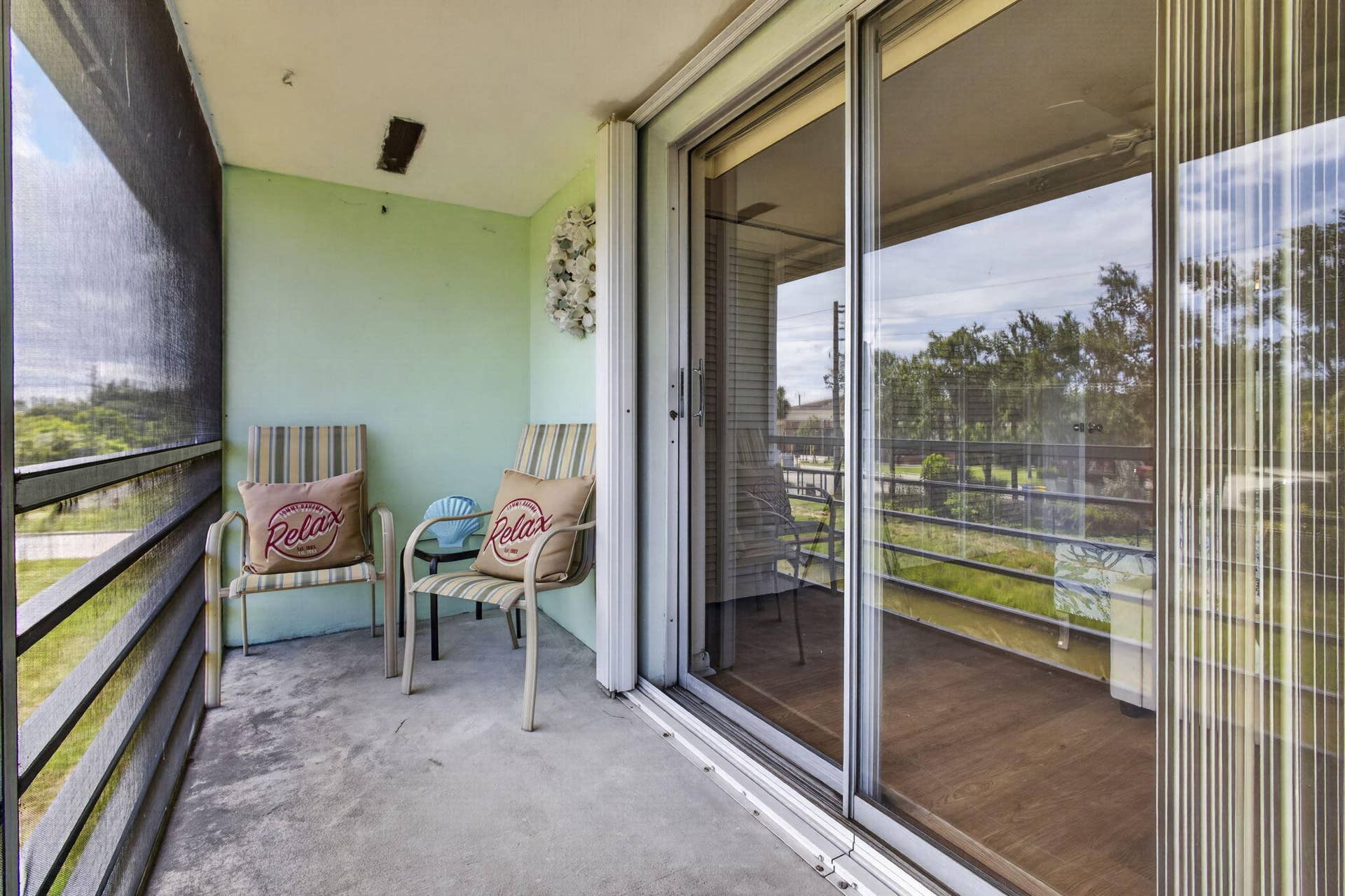 181 Bedford G, West Palm Beach, FL 33417 Sliders to outside and bedroom have storm shutters