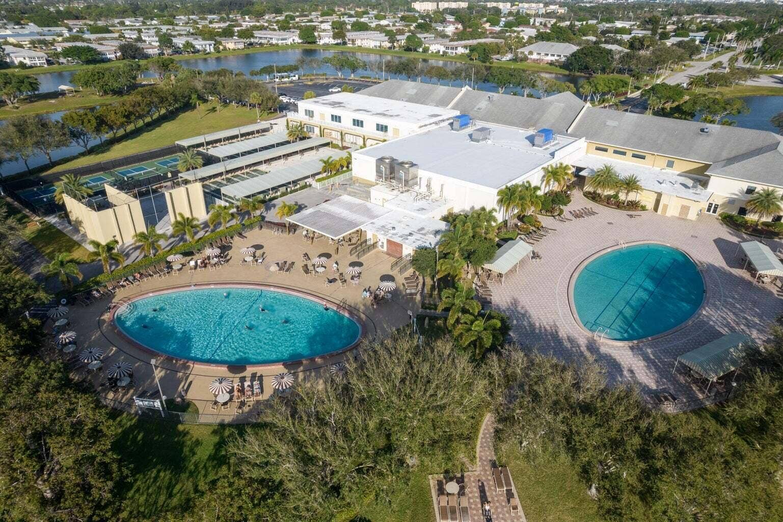 181 Bedford G, West Palm Beach, FL 33417 CVWPB Club House with three pools 2 outd