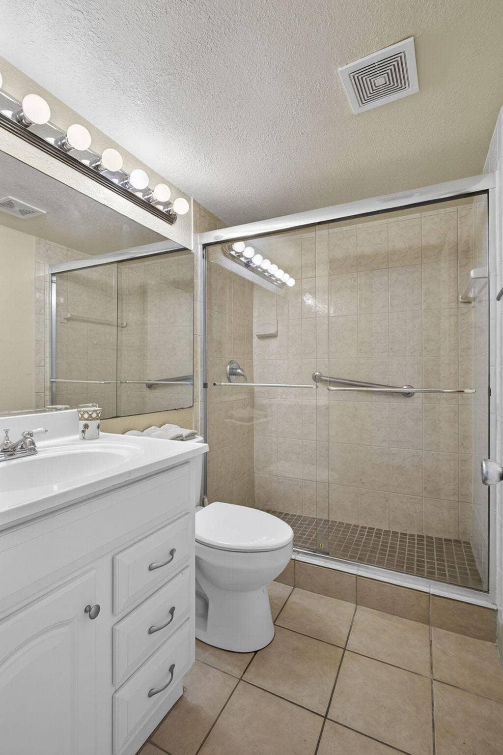 181 Bedford G, West Palm Beach, FL 33417 Walk in large shower with slider doors and nice vanity!