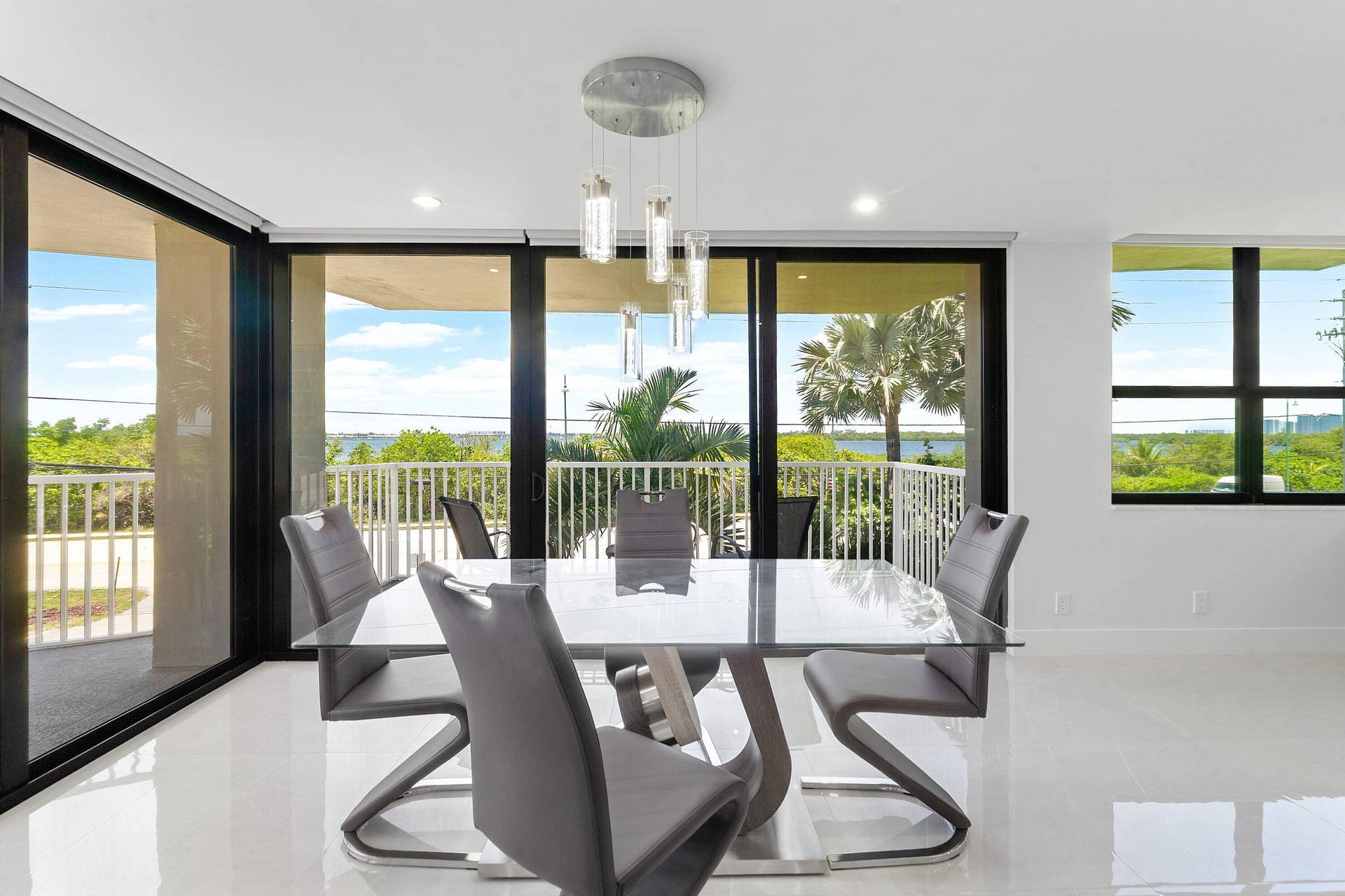 5480 N Ocean Drive, #B1c, Singer Island, Singer Island, FL 33404 Dining w/ Chandelier
