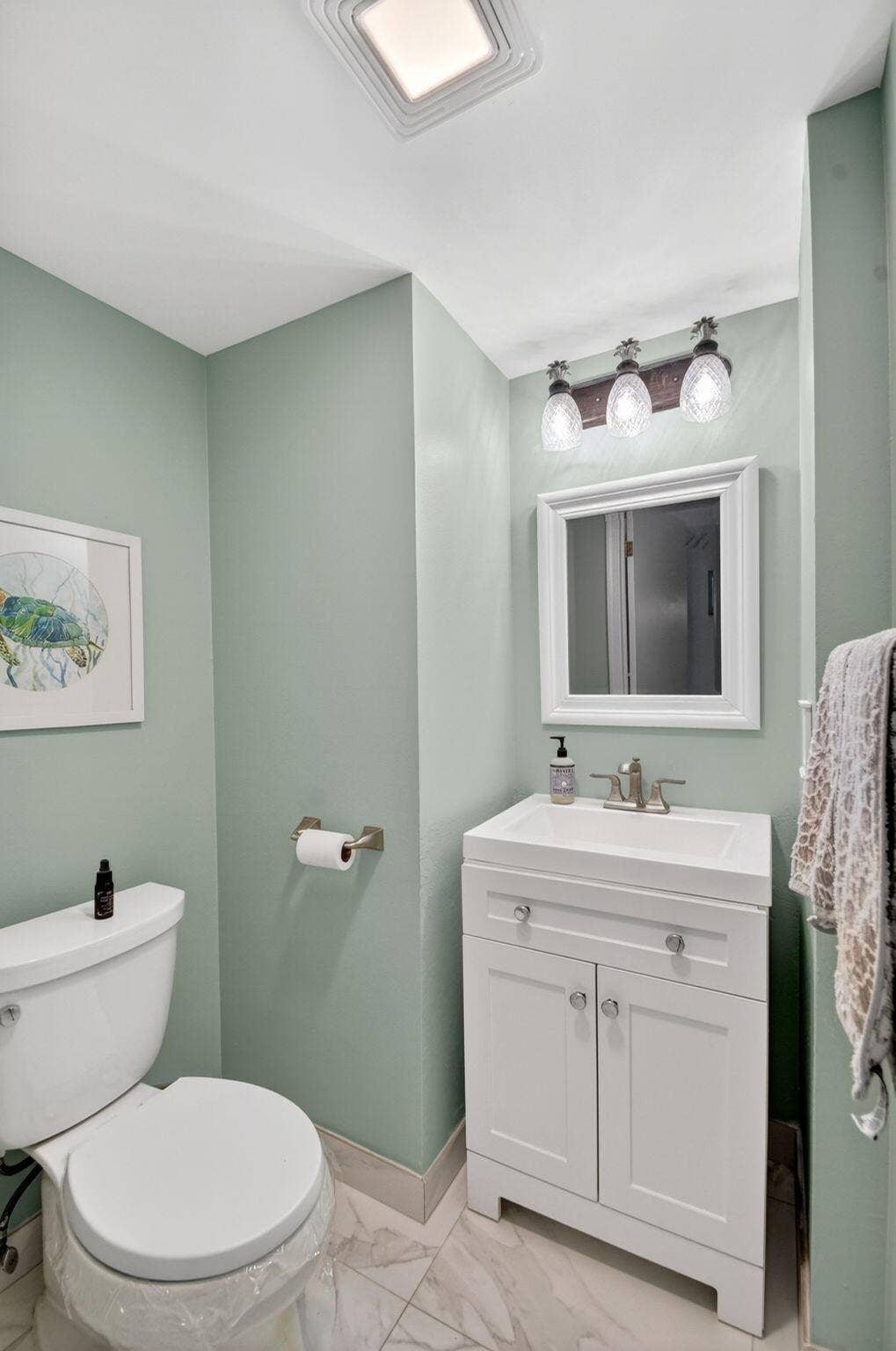 3601 S Ocean Boulevard, #104, South Palm Beach, FL 33480 guest half bath