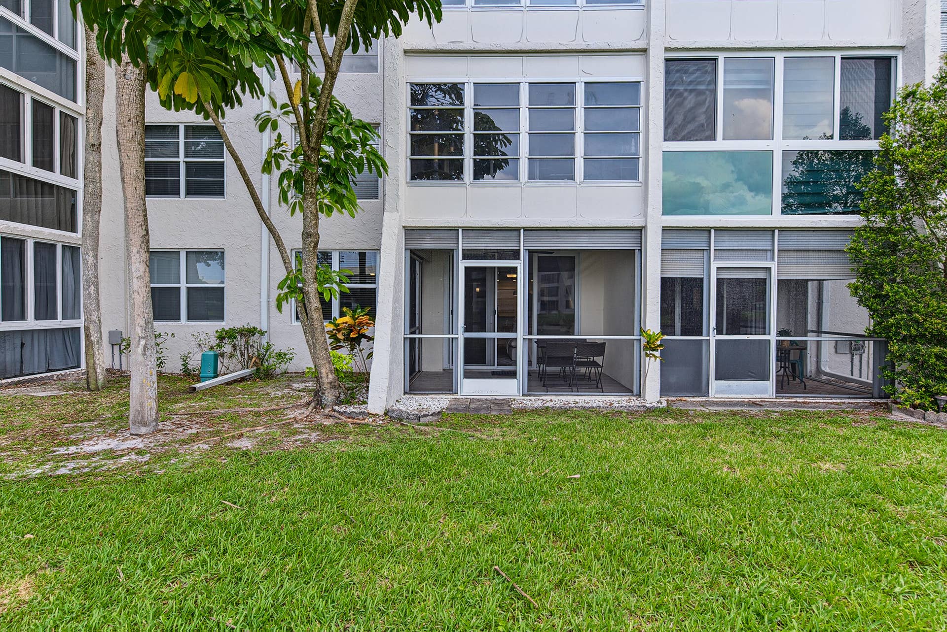 9420 Poinciana Place, #108, Davie, FL 33324 Screened patio overlooking lake