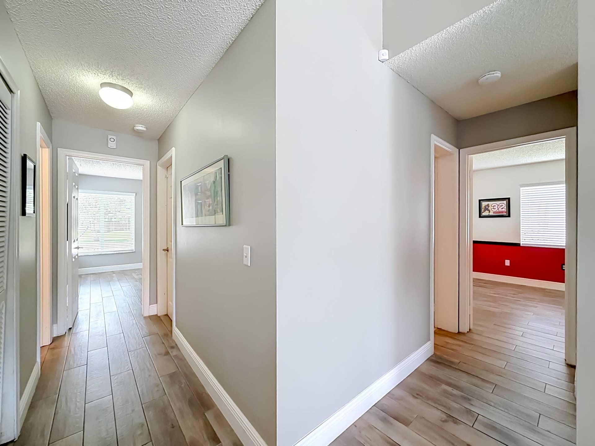 16751 Redwood Way, Weston, FL 33326 Hallway to 3rd split, 4th bedroom with full bath on left