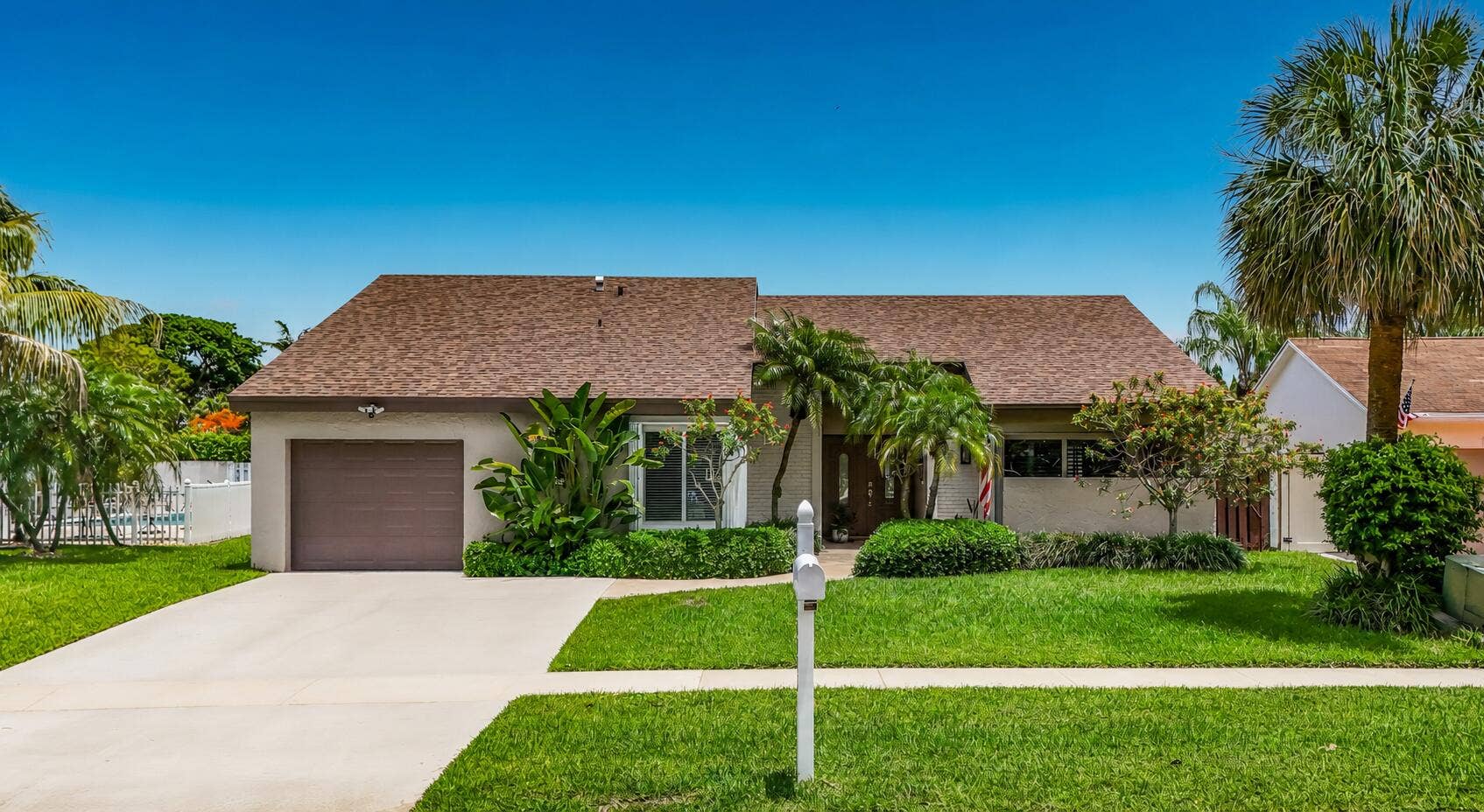 16751 Redwood Way, Weston, FL 33326 Front of home room for 4 cars in driveway, roof 2024