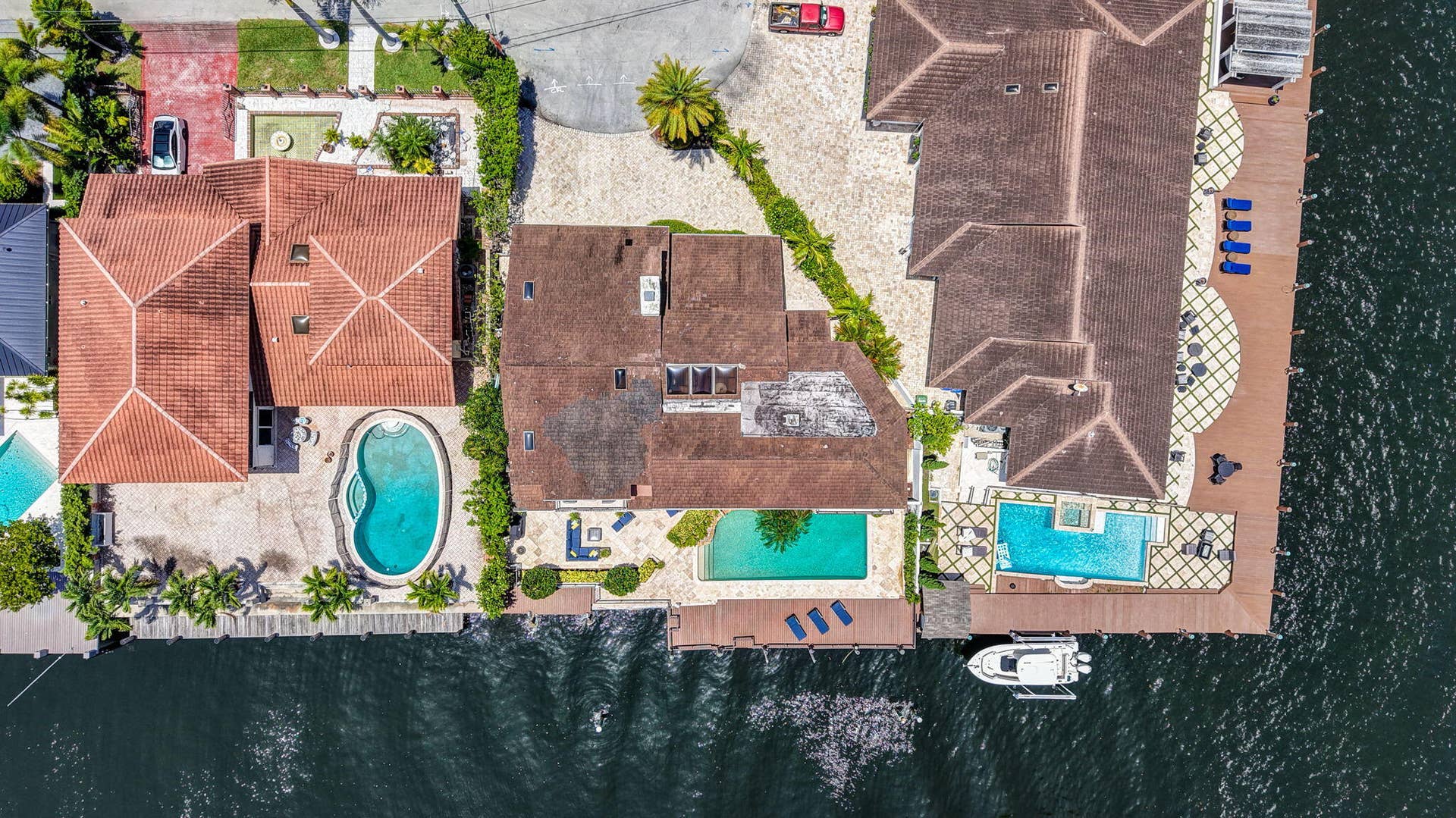 3110 NE 47th Street, Fort Lauderdale, FL 33308 The overhead aerial clarifies the lot layout, pool placement, dockage, and waterfront orientation.