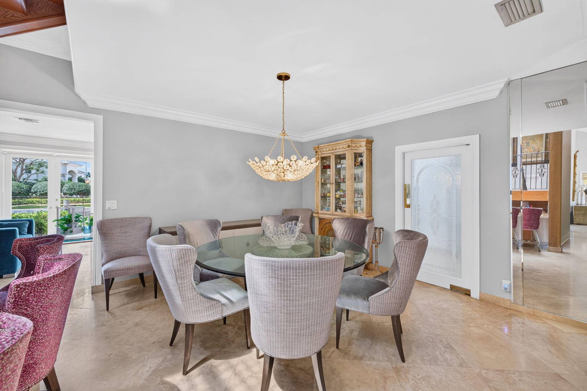 3110 NE 47th Street, Fort Lauderdale, FL 33308 The dining room offers a polished setting with soft natural light and garden-facing views.