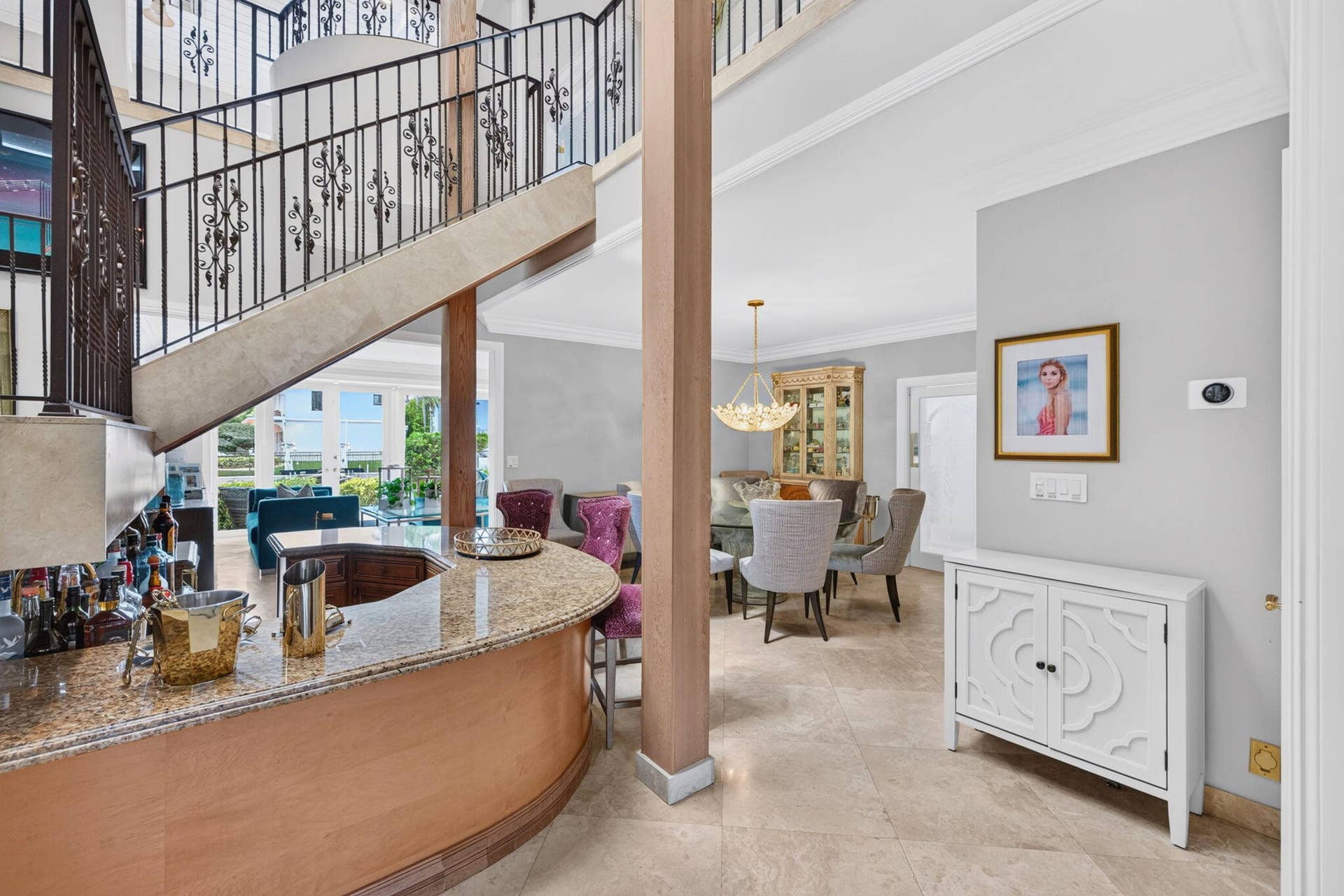 3110 NE 47th Street, Fort Lauderdale, FL 33308 A convenient wet bar connects the entertaining spaces and supports effortless hosting between the living and dining areas.