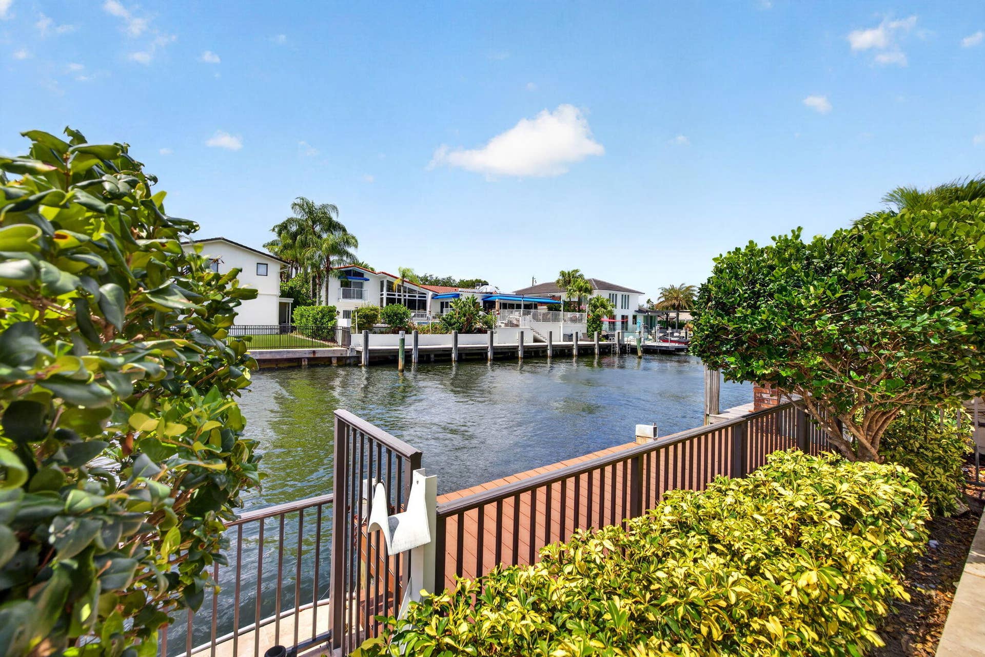 3110 NE 47th Street, Fort Lauderdale, FL 33308 The terrace frames peaceful water views, emphasizing the homes Fort Lauderdale waterfront setting.