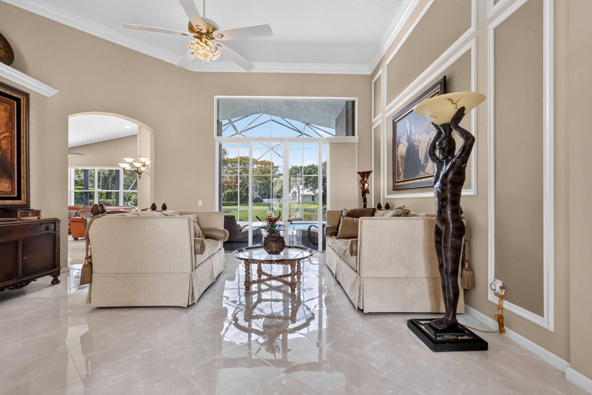 Lovely flooring throughout. The arches brings character & adds beauty to this lovely home.