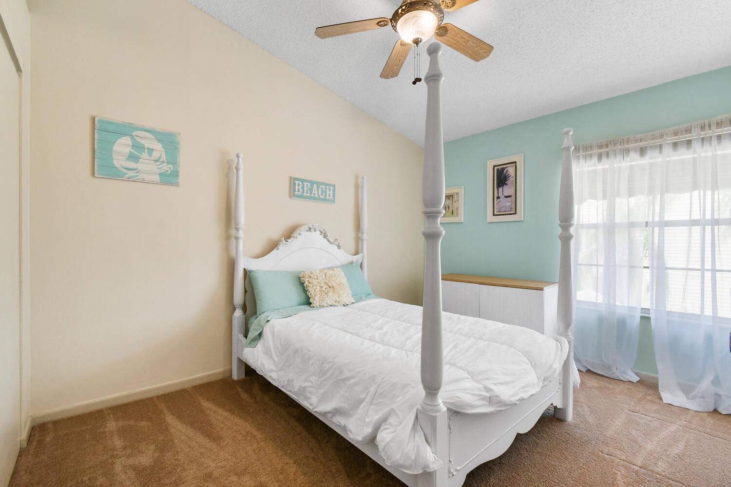 5266 Sapphire Valley, Boca Raton, FL 33486 Spacious guest bedroom featuring vaulted ceilings, abundant natural light, and a comfortable layout with ample closet space. A bright and inviting retreat for family or guests.