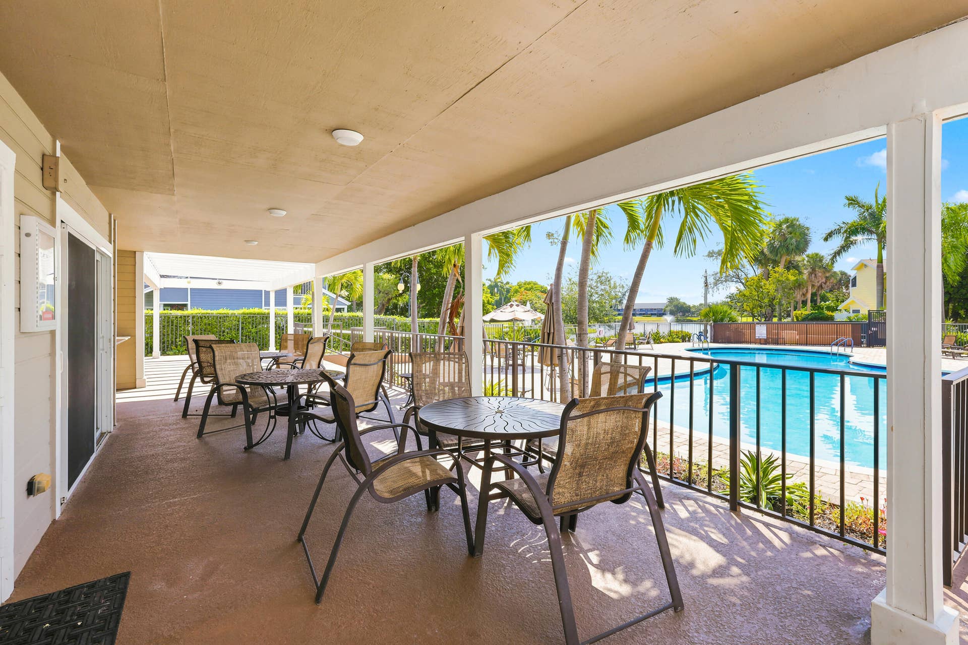 5266 Sapphire Valley, Boca Raton, FL 33486 Resort style community pool surrounded by lush tropical landscaping, offering the perfect place to relax, soak up the South Florida sunshine, or unwind after a day on the course.