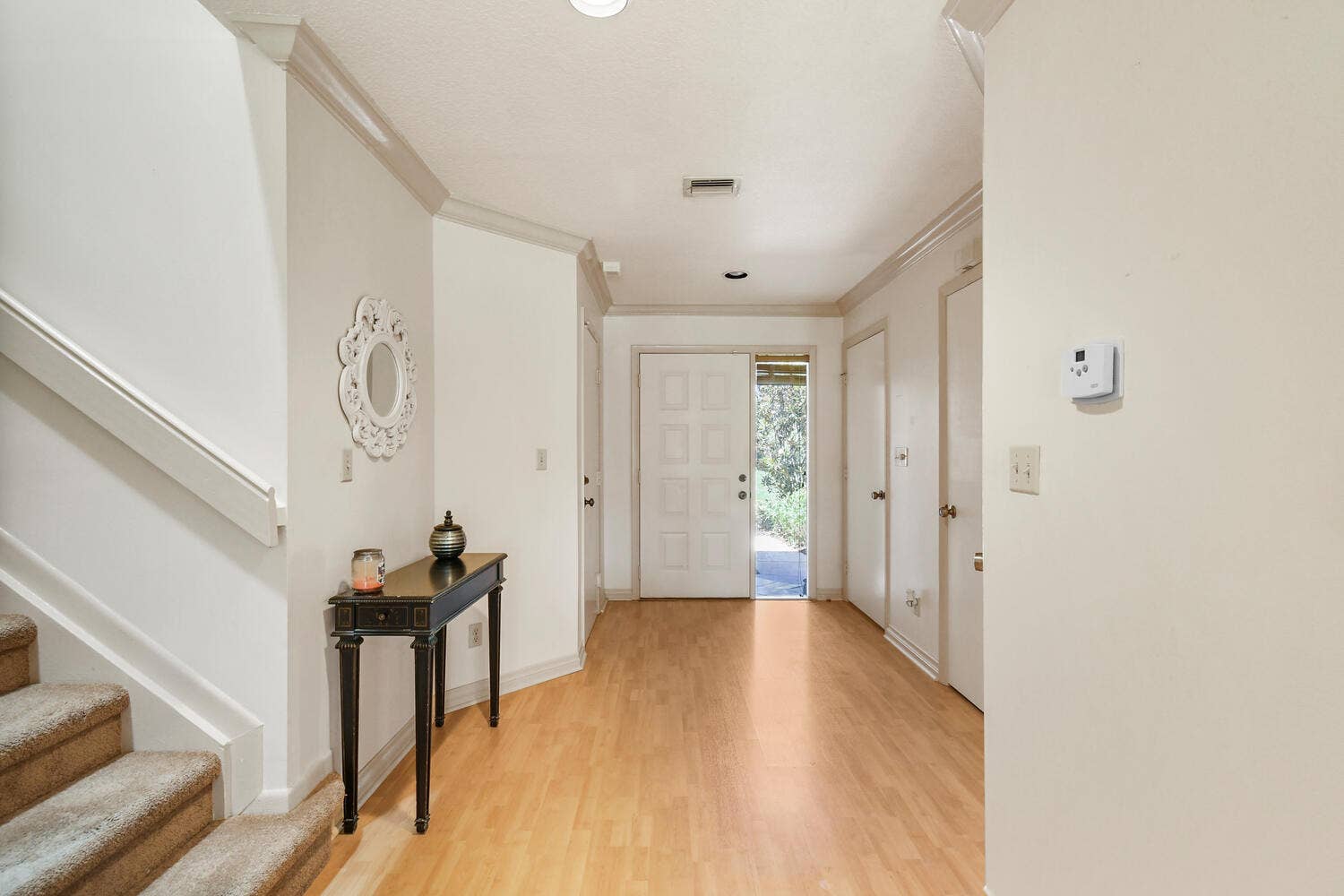 5266 Sapphire Valley, Boca Raton, FL 33486 Welcoming front entry with soaring ceilings, abundant natural light, and an open layout that creates an impressive first impression while seamlessly connecting the home's living and dining spaces.
