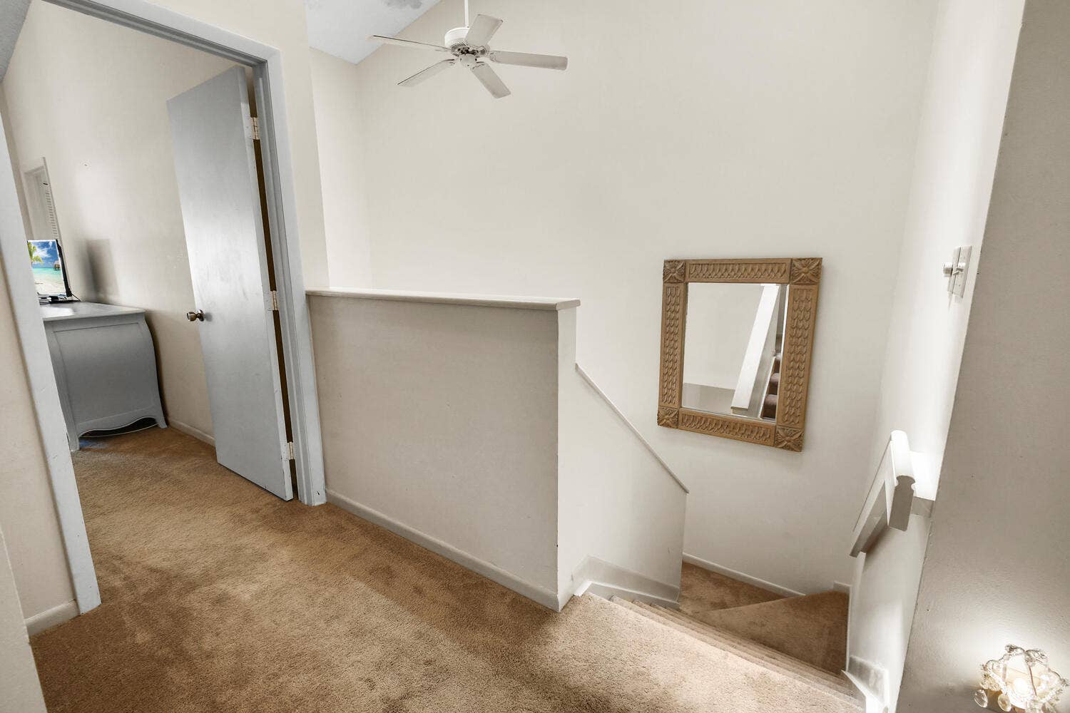 5266 Sapphire Valley, Boca Raton, FL 33486 Open second-floor landing featuring vaulted ceilings and an airy design that enhances the home's spacious feel while providing convenient access to all bedrooms and bathrooms.