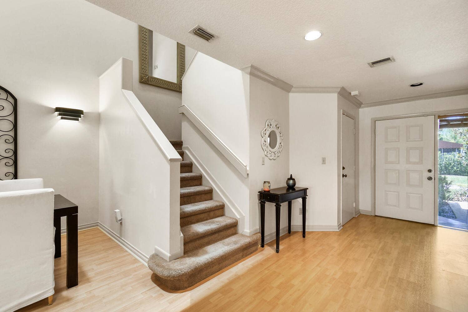 5266 Sapphire Valley, Boca Raton, FL 33486 Welcoming front entry with soaring ceilings, abundant natural light, and an open layout that creates an impressive first impression while seamlessly connecting the home's living and dining spaces.