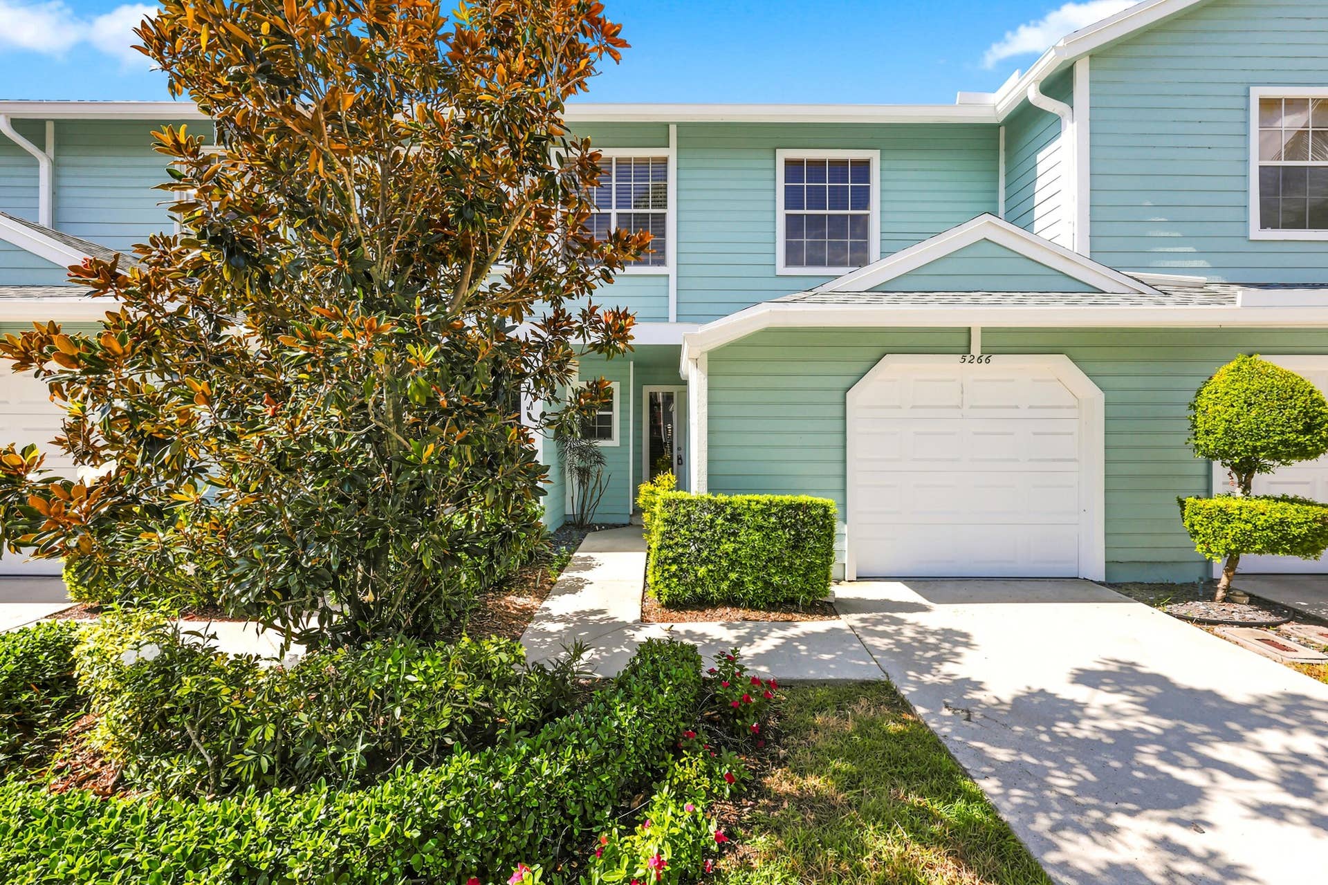 5266 Sapphire Valley, Boca Raton, FL 33486 Welcome home to this beautifully maintained townhome in the gated community of Fairfield, featuring a private driveway, one-car garage, and lush tropical landscaping in the heart of Boca Raton.