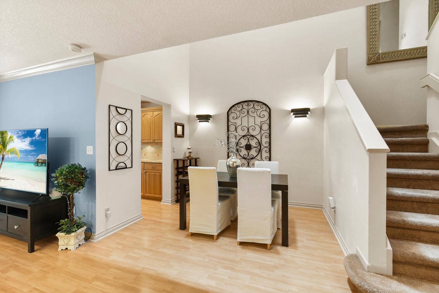 5266 Sapphire Valley, Boca Raton, FL 33486 Elegant formal dining area with soaring ceilings, an open layout, and seamless access to the main living spaces, creating the perfect setting for everyday living and entertaining.