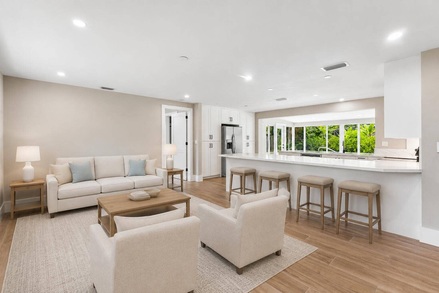 945 Westwind Drive, North Palm Beach, FL 33408 Living room virtually staged