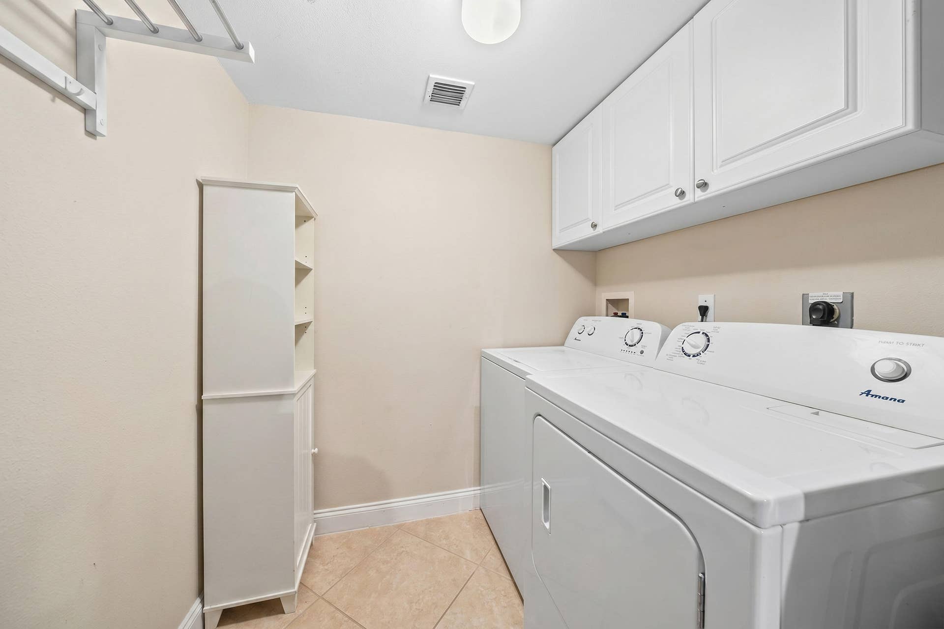 3594 S Ocean Boulevard, #604, Highland Beach, FL 33487 Large laundry room with ample storage