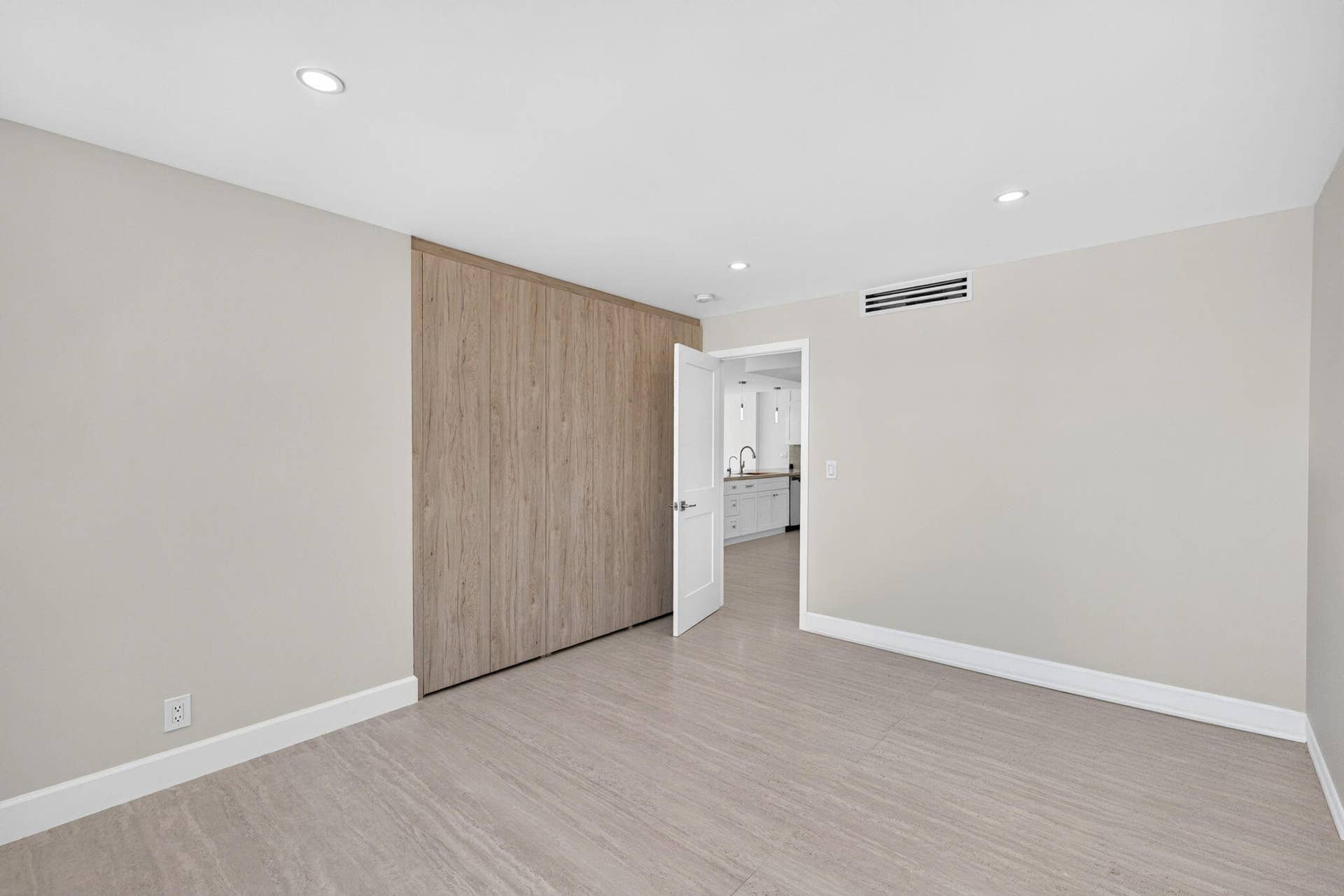 Guest bedroom with custom cabinetry