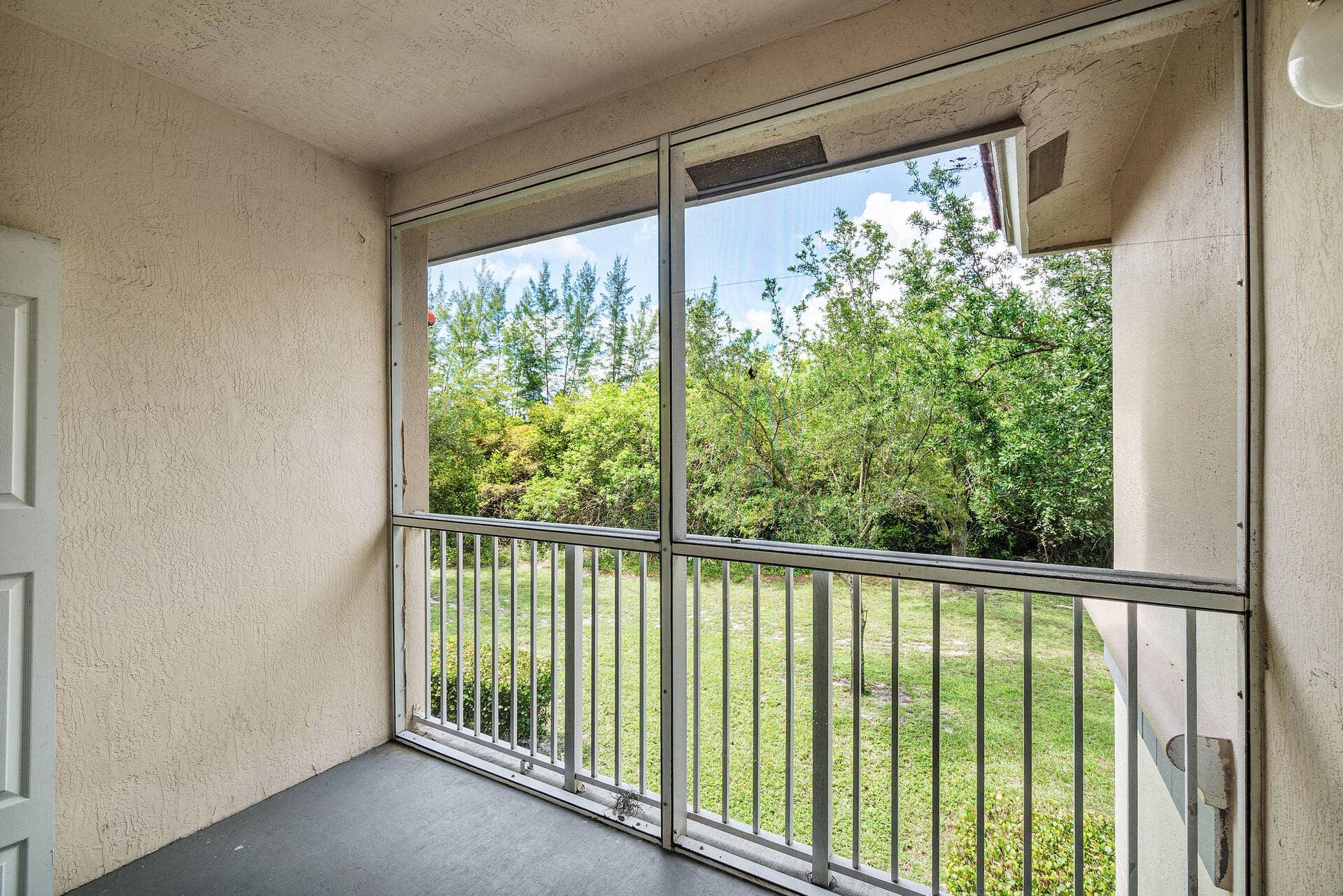 1161 Golden Lakes Boulevard, #1325, West Palm Beach, FL 33411 screen balcony